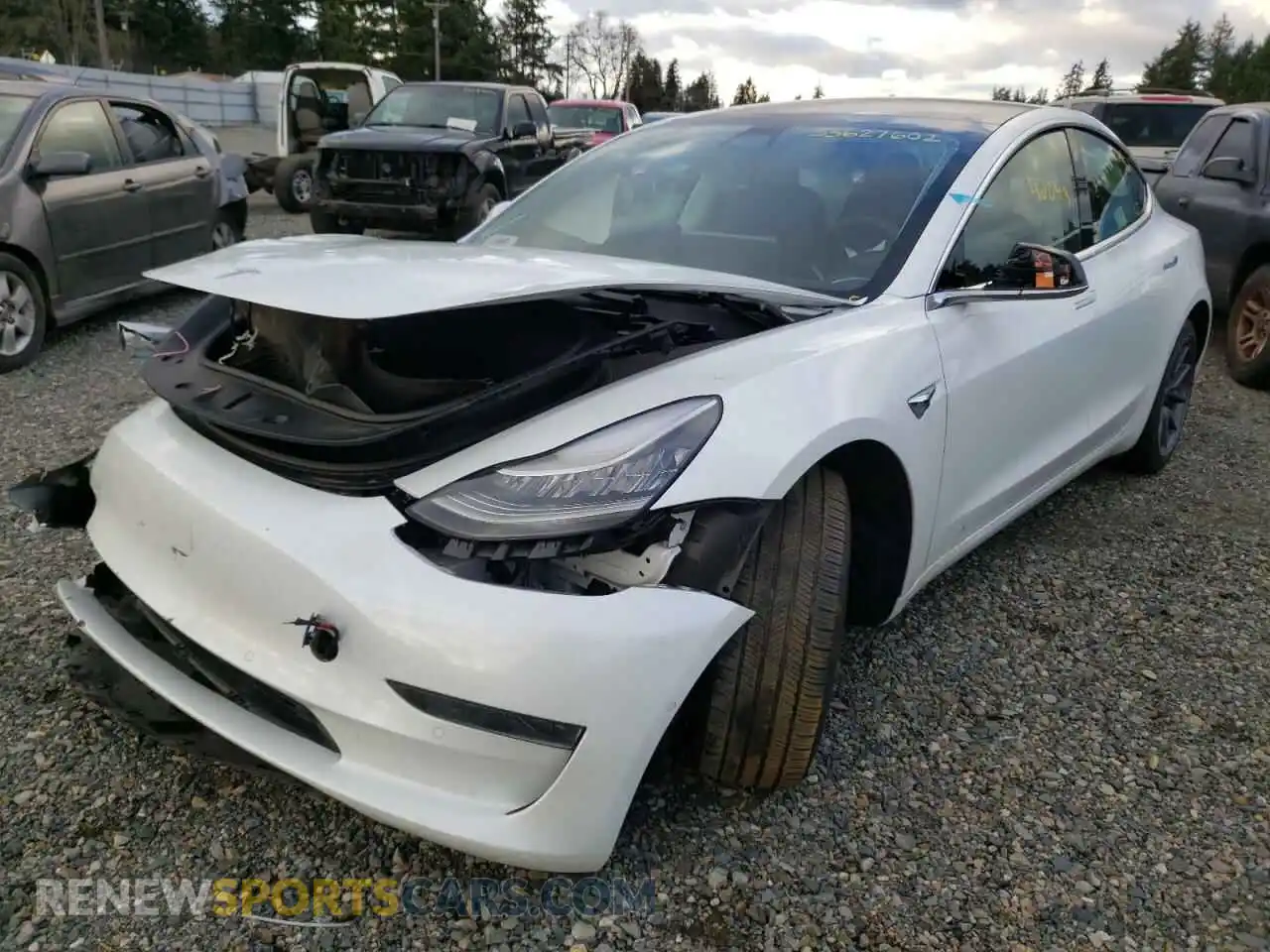 2 Photograph of a damaged car 5YJ3E1EA7LF504797 TESLA MODEL 3 2020