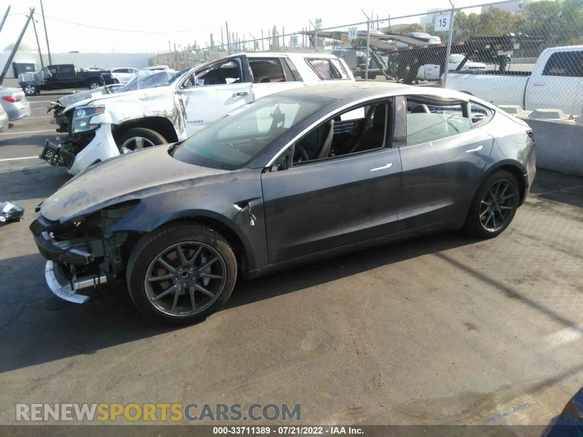 2 Photograph of a damaged car 5YJ3E1EA7LF703199 TESLA MODEL 3 2020