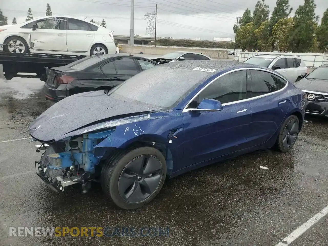 1 Photograph of a damaged car 5YJ3E1EA7LF705759 TESLA MODEL 3 2020