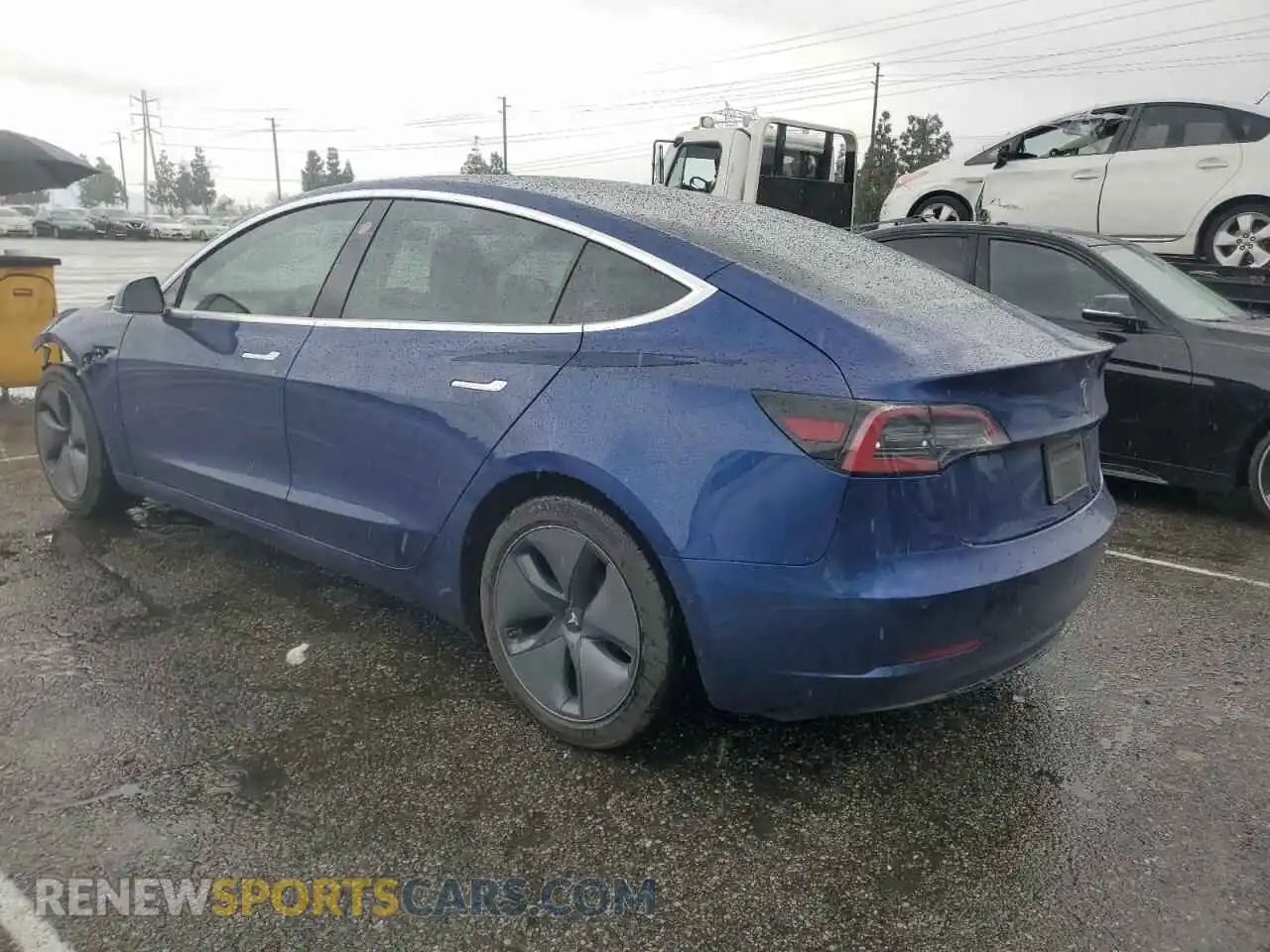 2 Photograph of a damaged car 5YJ3E1EA7LF705759 TESLA MODEL 3 2020
