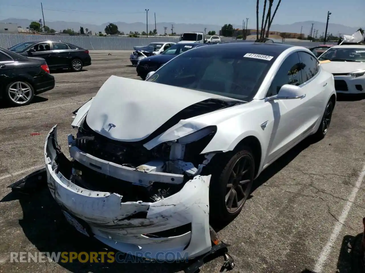 2 Photograph of a damaged car 5YJ3E1EA7LF710072 TESLA MODEL 3 2020