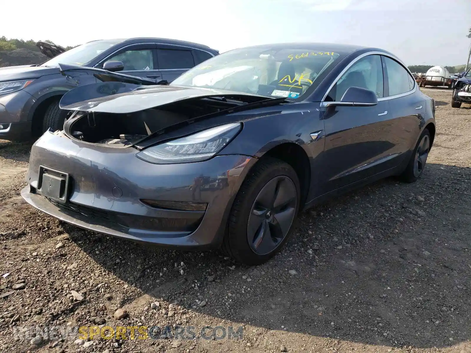 2 Photograph of a damaged car 5YJ3E1EA8LF736714 TESLA MODEL 3 2020