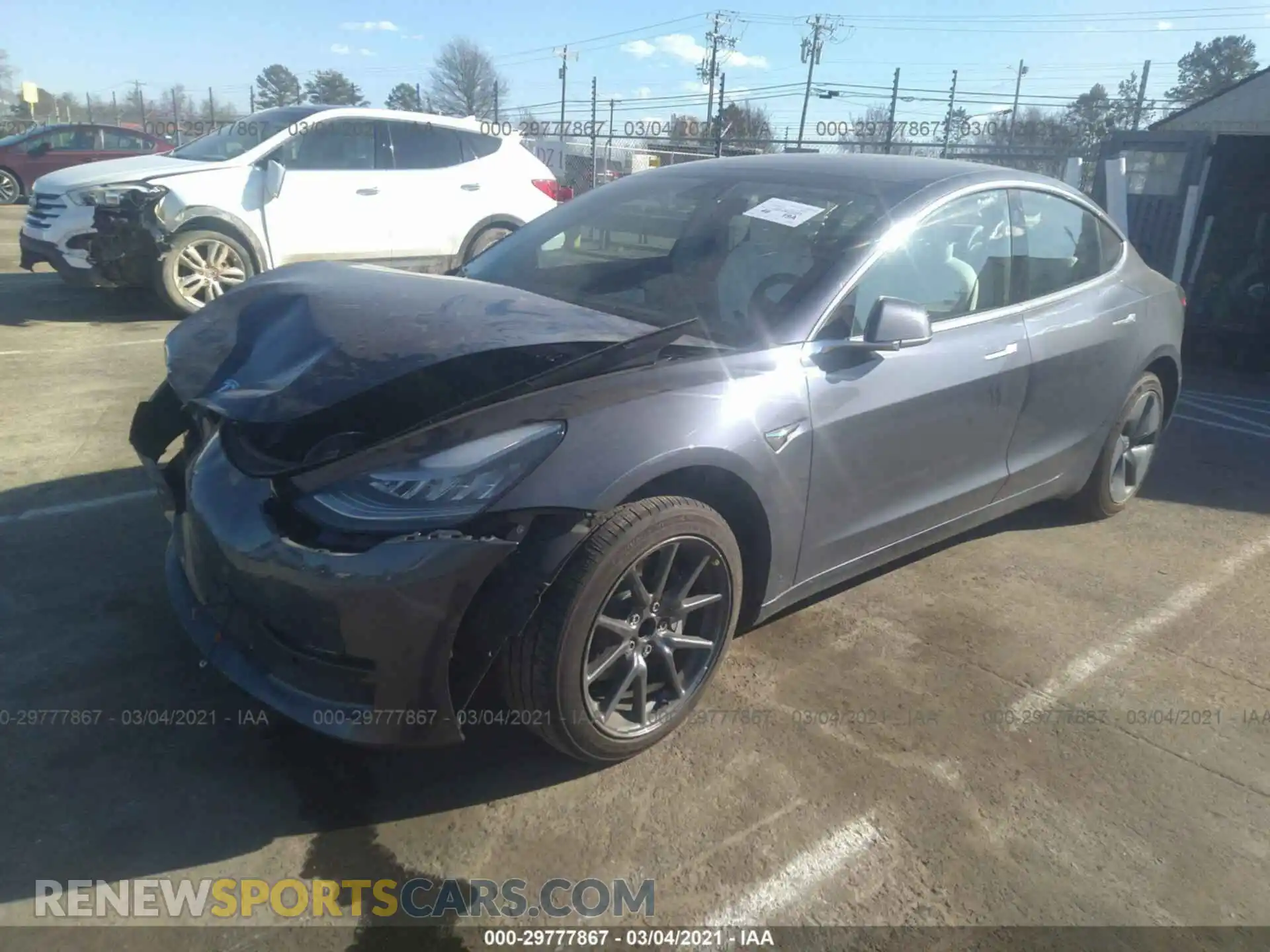 2 Photograph of a damaged car 5YJ3E1EA9LF530415 TESLA MODEL 3 2020