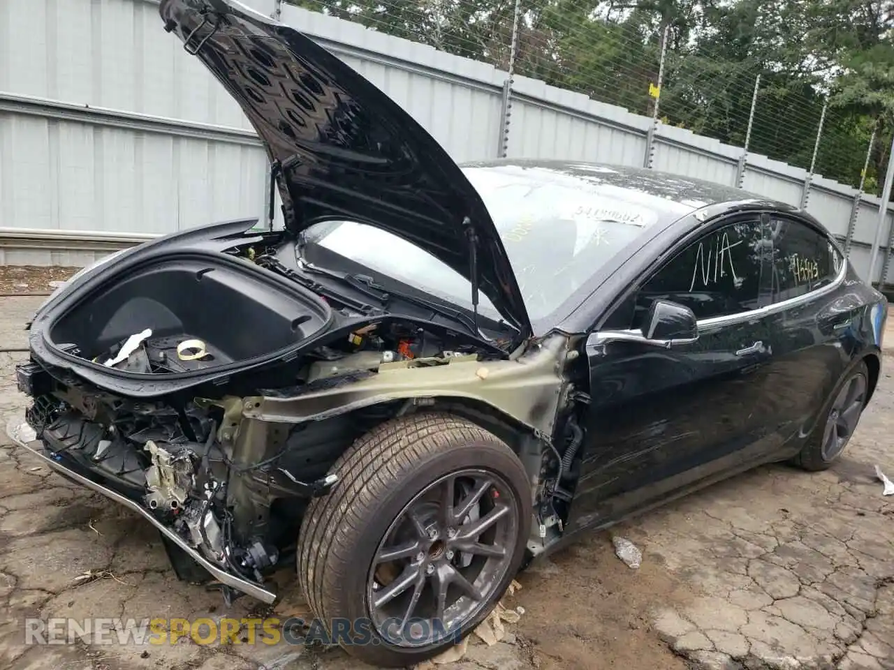 2 Photograph of a damaged car 5YJ3E1EA9LF590243 TESLA MODEL 3 2020