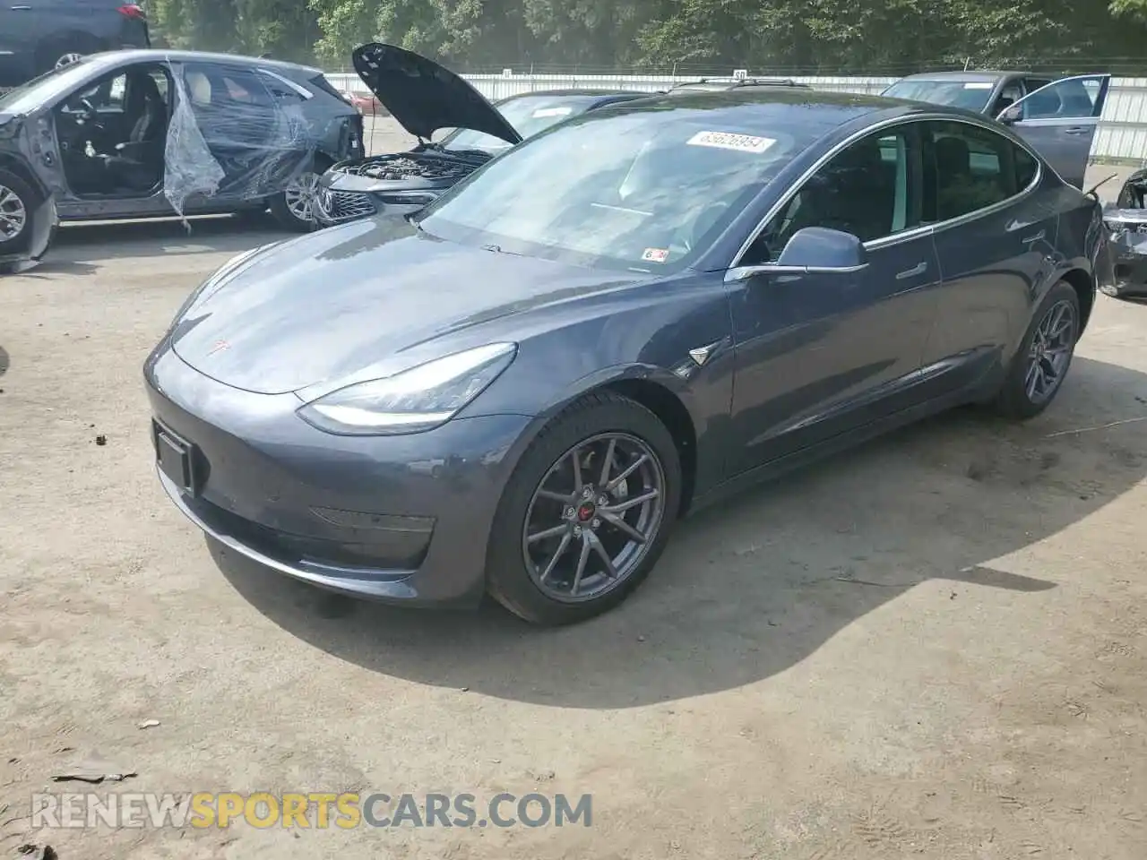 1 Photograph of a damaged car 5YJ3E1EA9LF597208 TESLA MODEL 3 2020