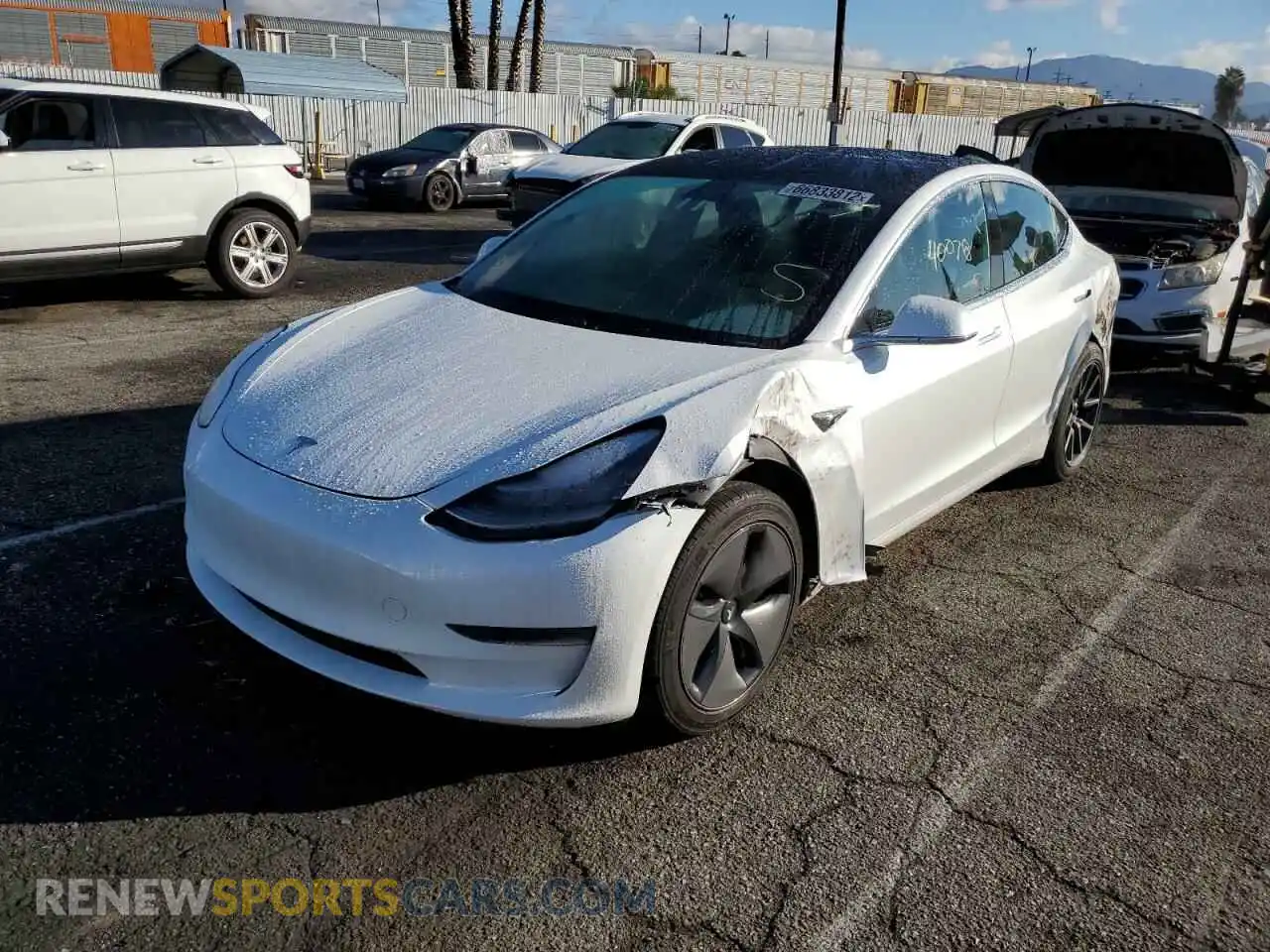 2 Photograph of a damaged car 5YJ3E1EA9LF633298 TESLA MODEL 3 2020