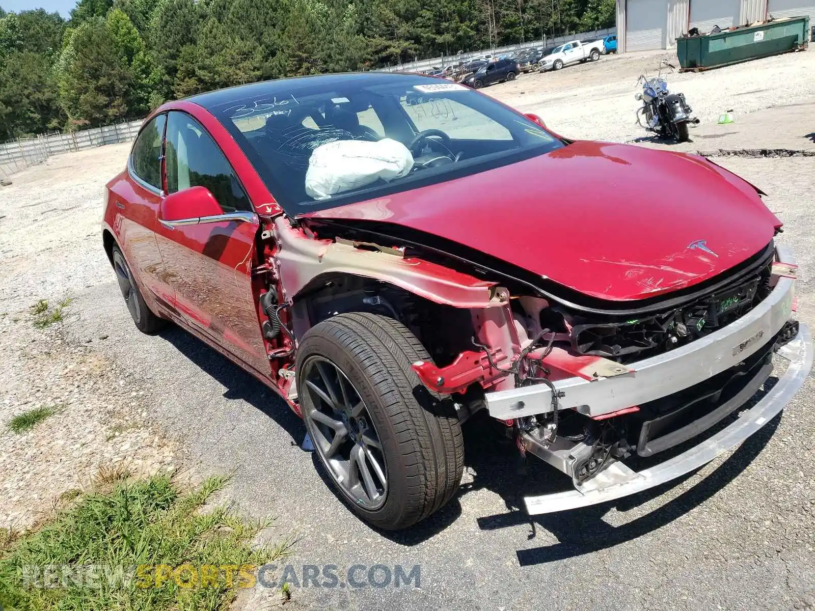 1 Photograph of a damaged car 5YJ3E1EA9LF703561 TESLA MODEL 3 2020