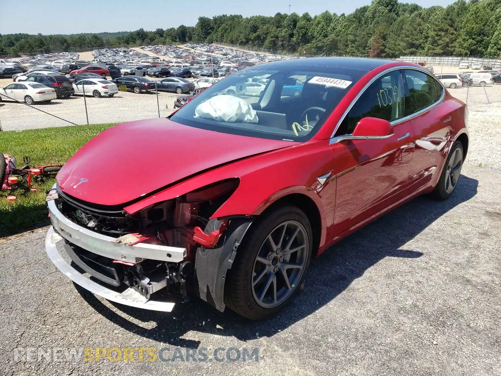 2 Photograph of a damaged car 5YJ3E1EA9LF703561 TESLA MODEL 3 2020