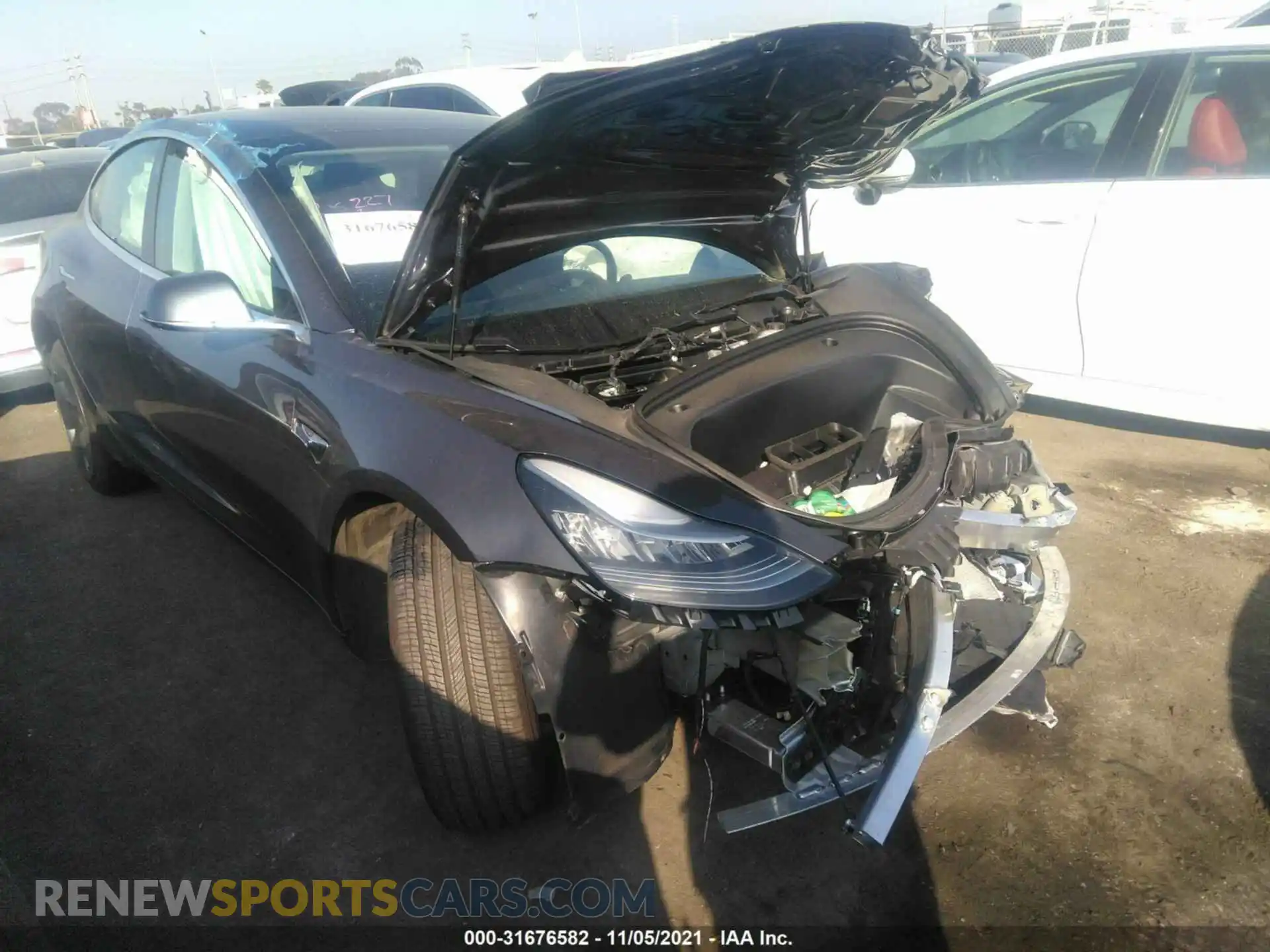 1 Photograph of a damaged car 5YJ3E1EA9LF803577 TESLA MODEL 3 2020