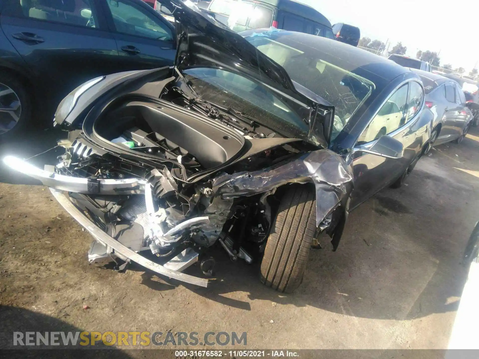 2 Photograph of a damaged car 5YJ3E1EA9LF803577 TESLA MODEL 3 2020