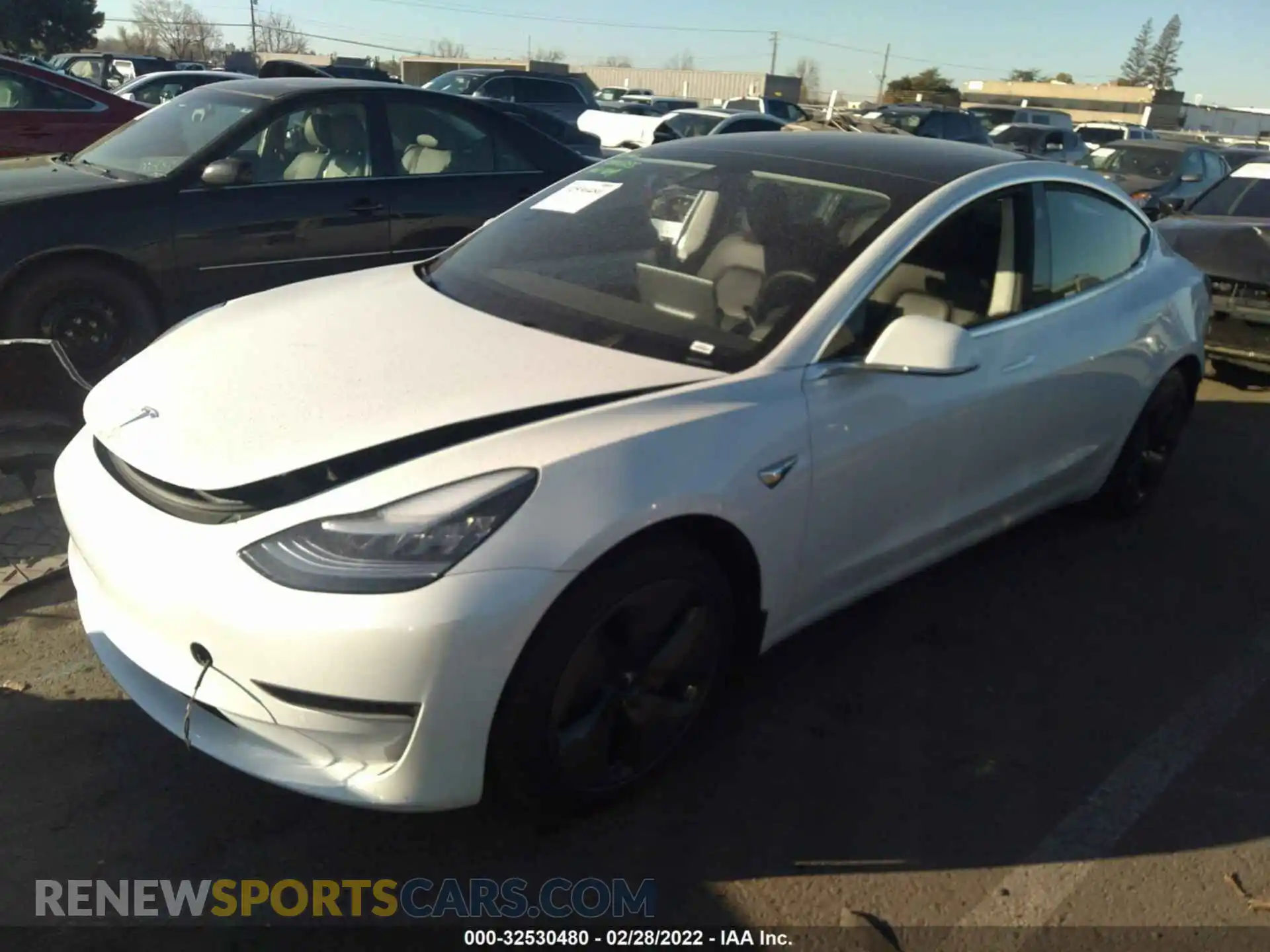 2 fotografías del automóvil dañado 5YJ3E1EA9LF804583 TESLA MODEL 3 2020