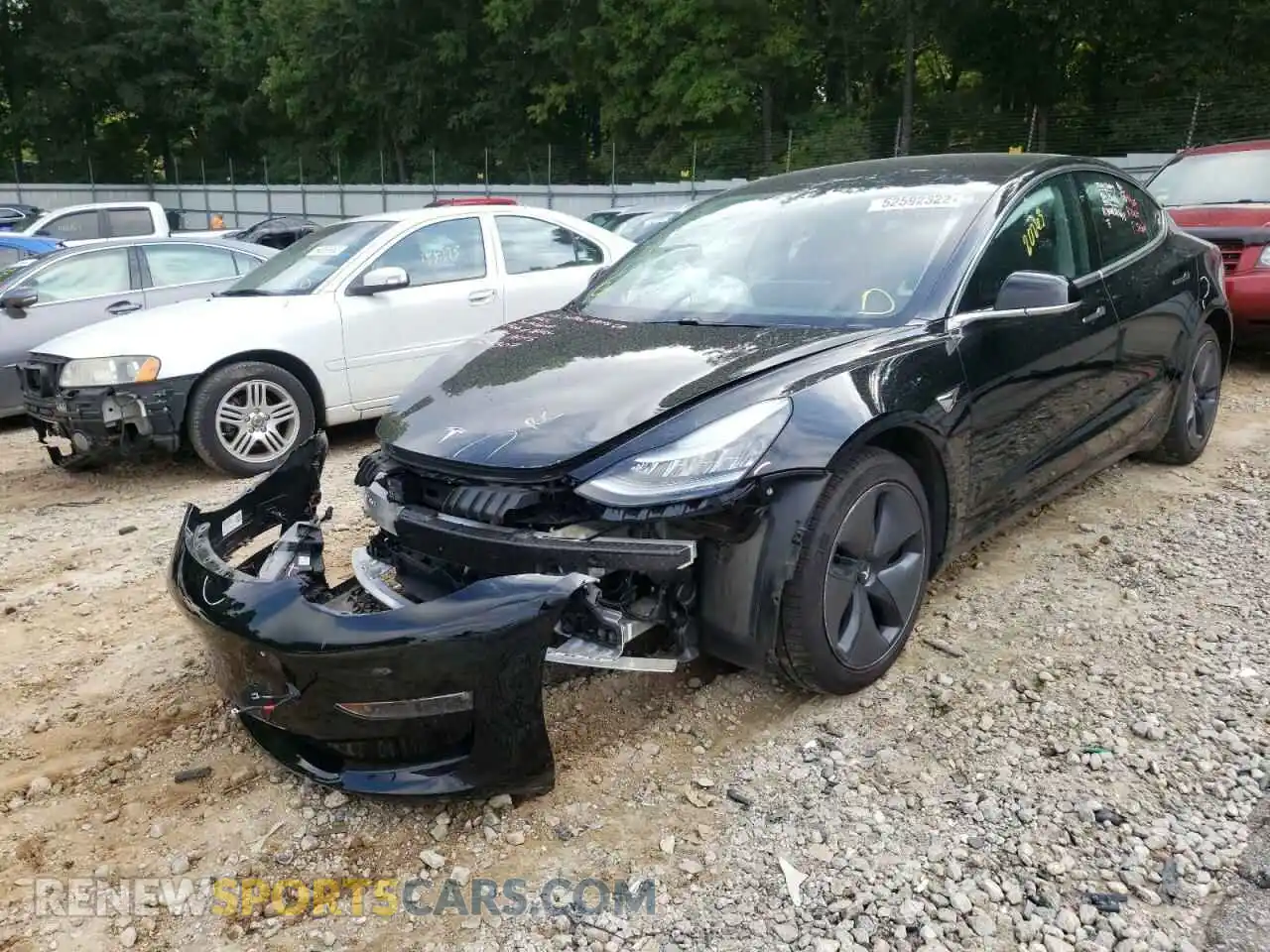 2 Photograph of a damaged car 5YJ3E1EB0LF599728 TESLA MODEL 3 2020