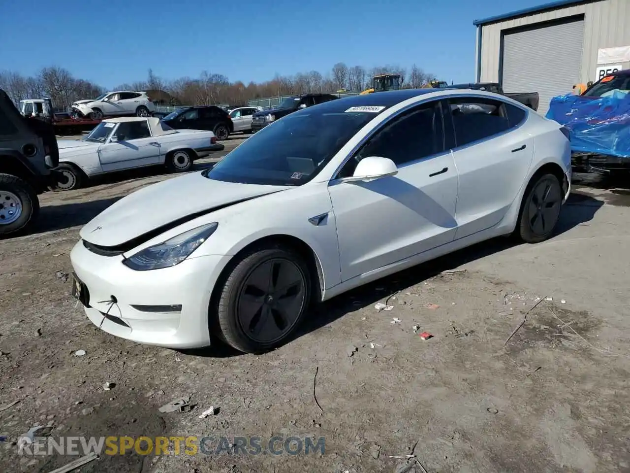 1 Photograph of a damaged car 5YJ3E1EB0LF628130 TESLA MODEL 3 2020