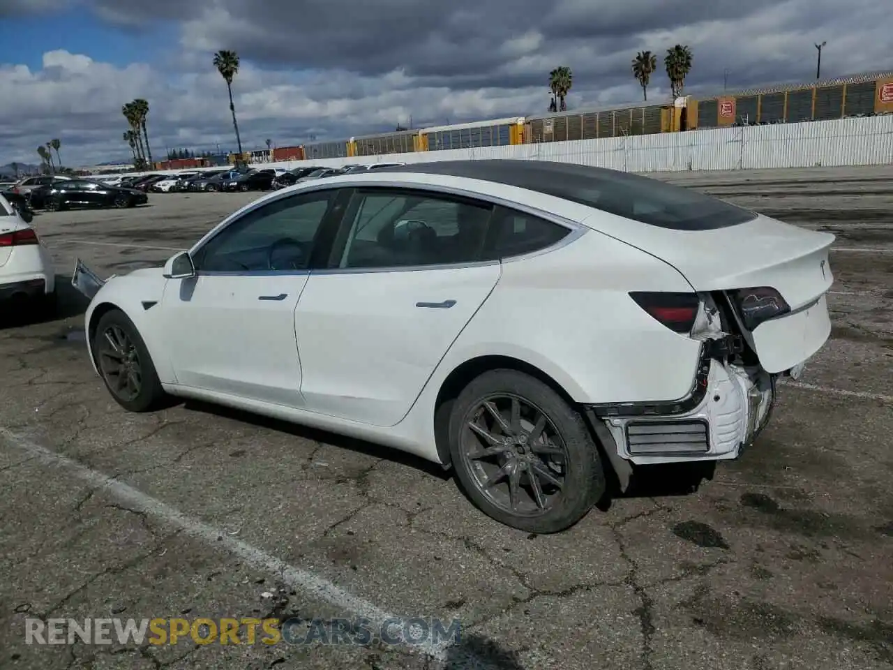 2 fotografías del automóvil dañado 5YJ3E1EB0LF665744 TESLA MODEL 3 2020