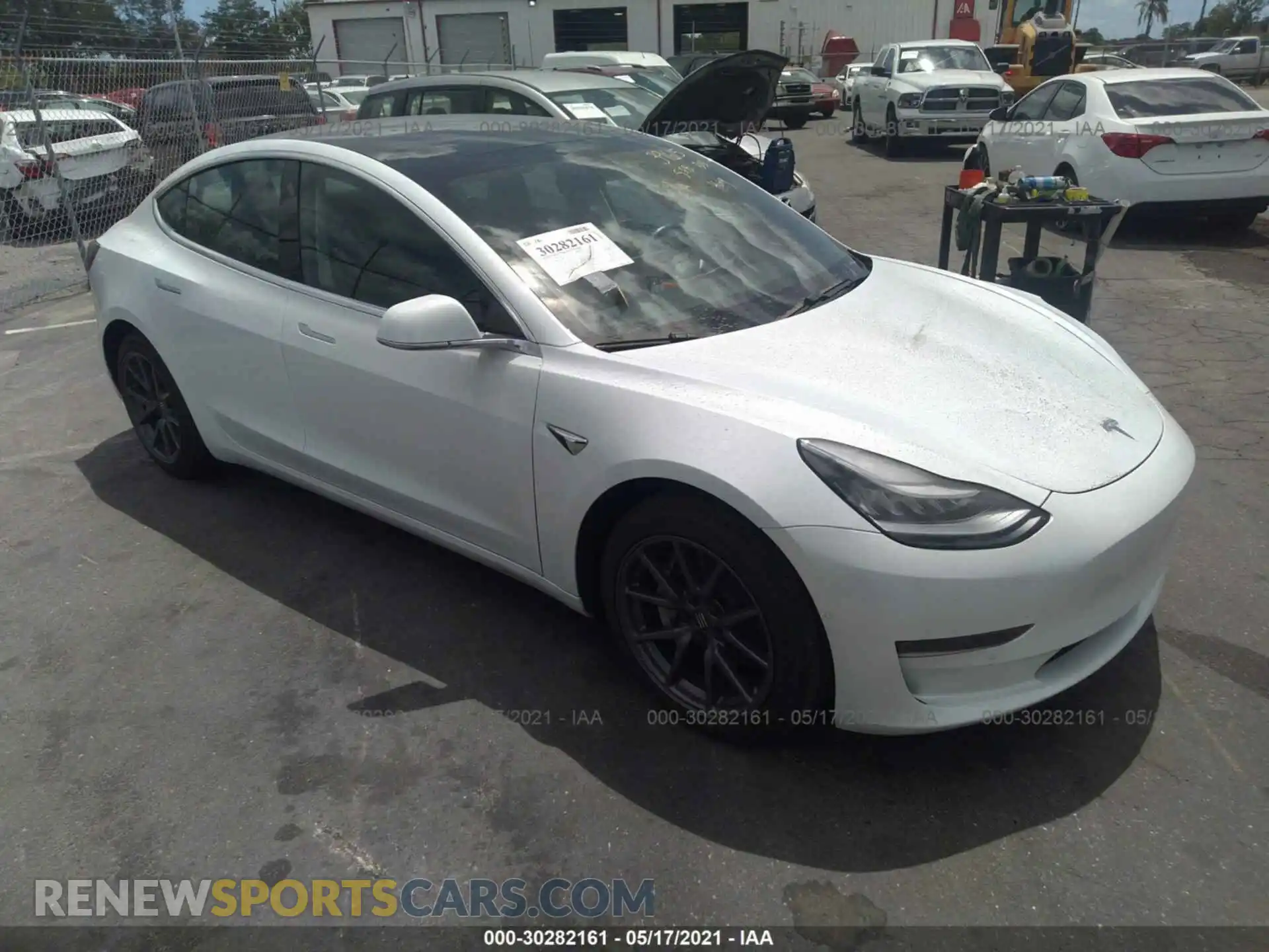 1 Photograph of a damaged car 5YJ3E1EB0LF711458 TESLA MODEL 3 2020