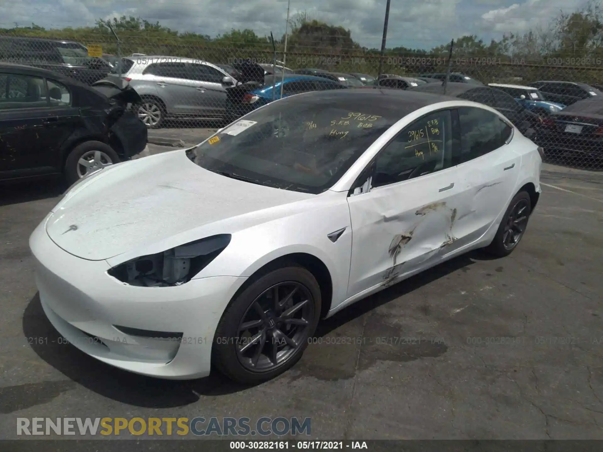 2 Photograph of a damaged car 5YJ3E1EB0LF711458 TESLA MODEL 3 2020