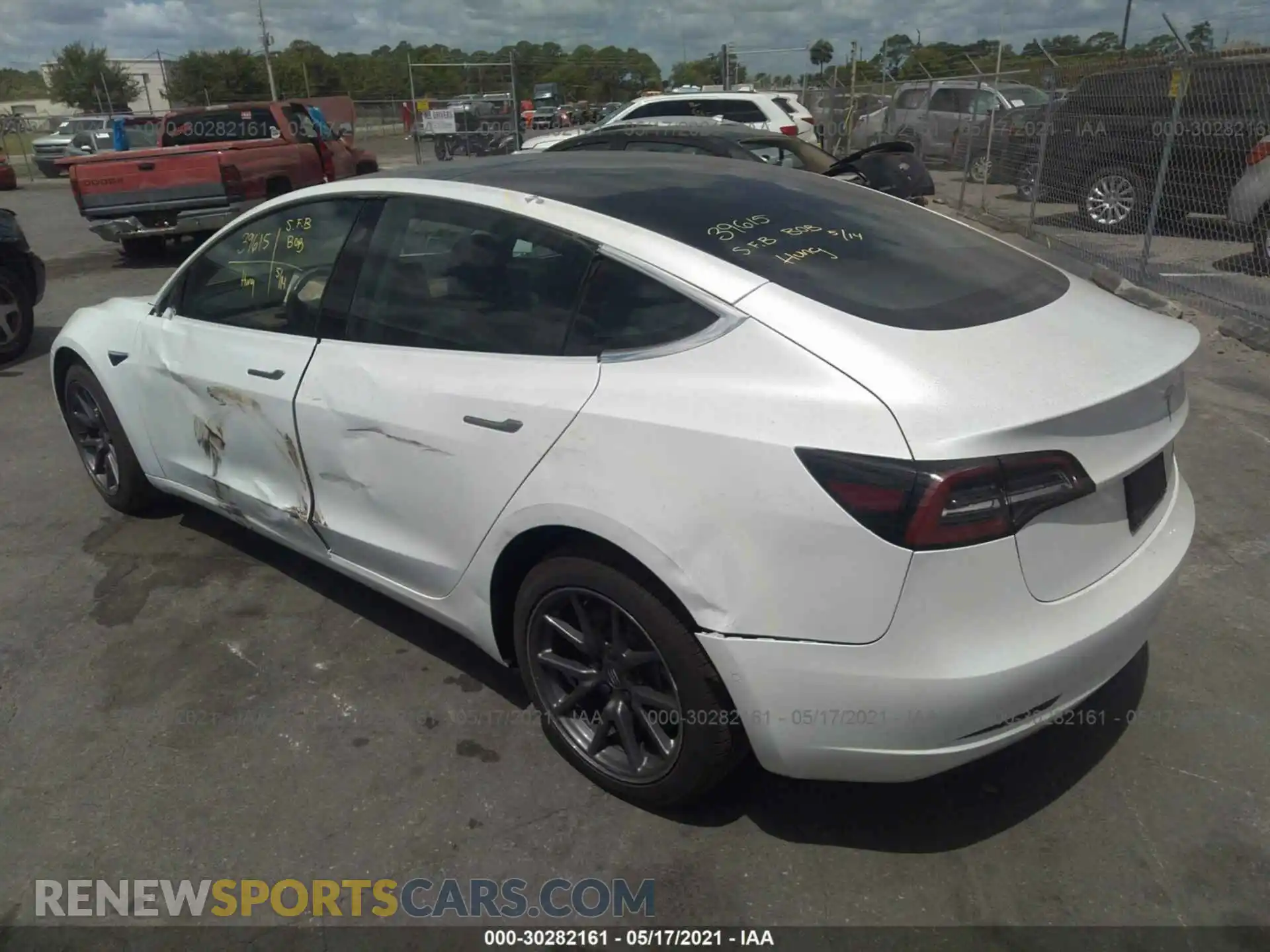 3 Photograph of a damaged car 5YJ3E1EB0LF711458 TESLA MODEL 3 2020