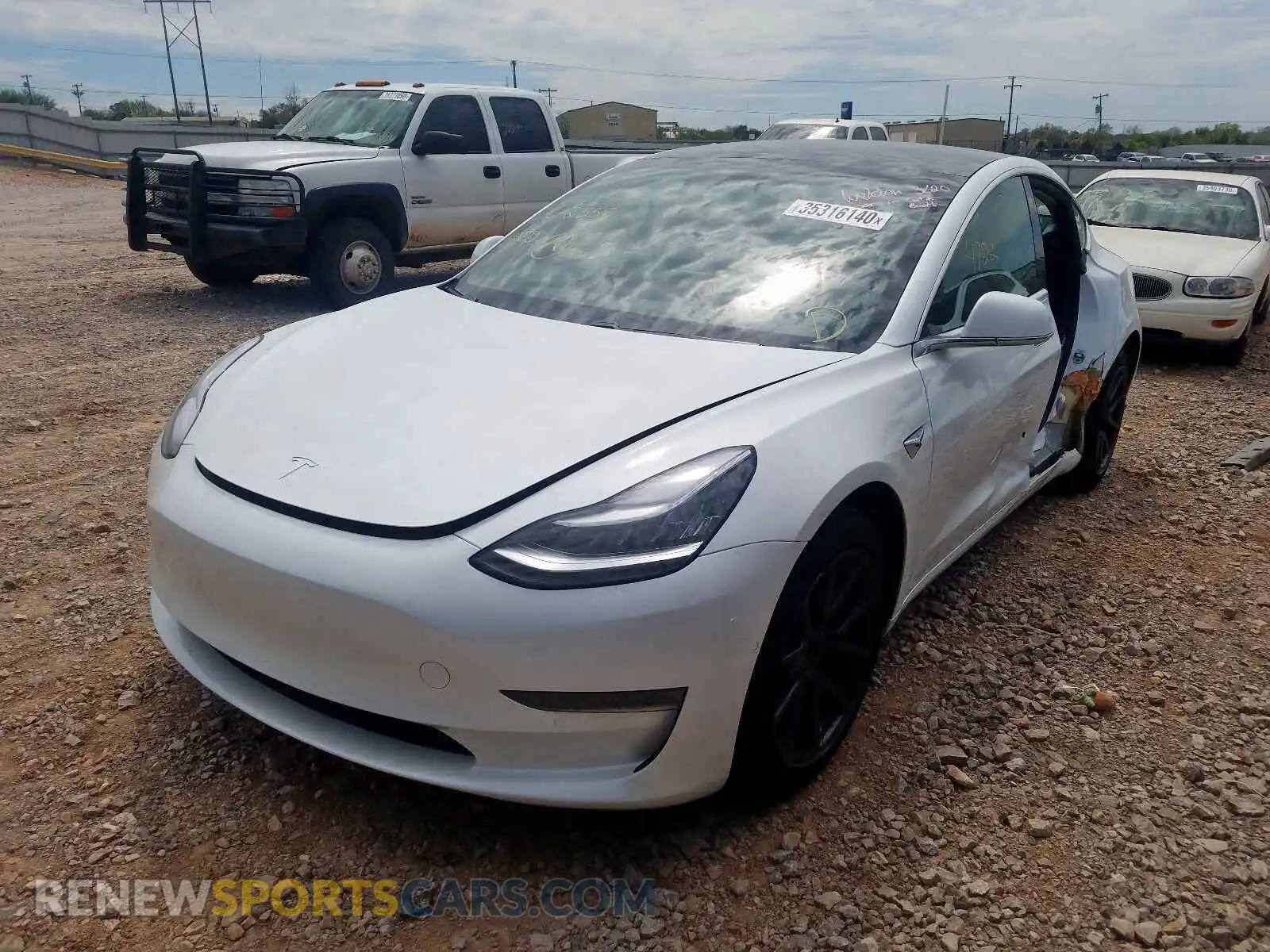 2 Photograph of a damaged car 5YJ3E1EB1LF618559 TESLA MODEL 3 2020