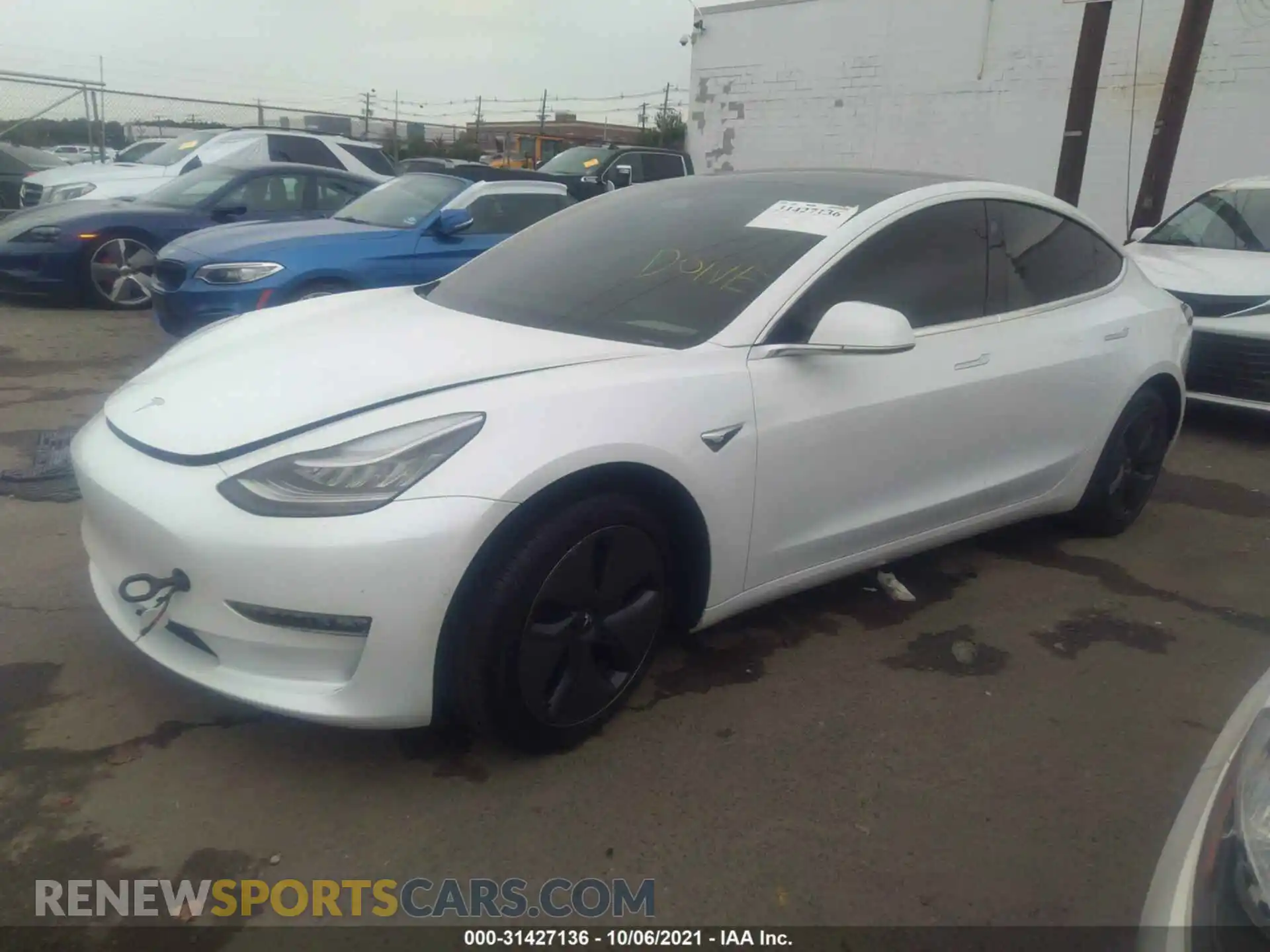 2 Photograph of a damaged car 5YJ3E1EB1LF637323 TESLA MODEL 3 2020