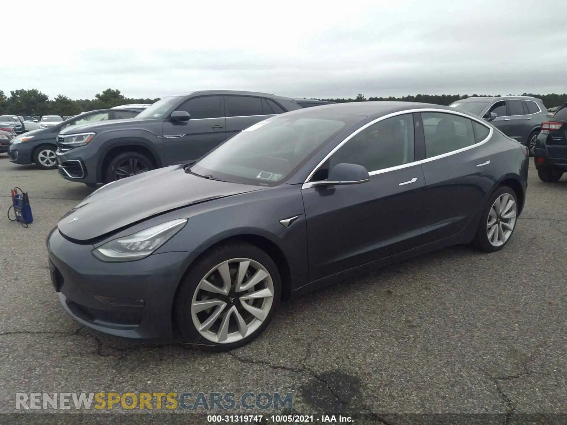 2 fotografías del automóvil dañado 5YJ3E1EB1LF647916 TESLA MODEL 3 2020