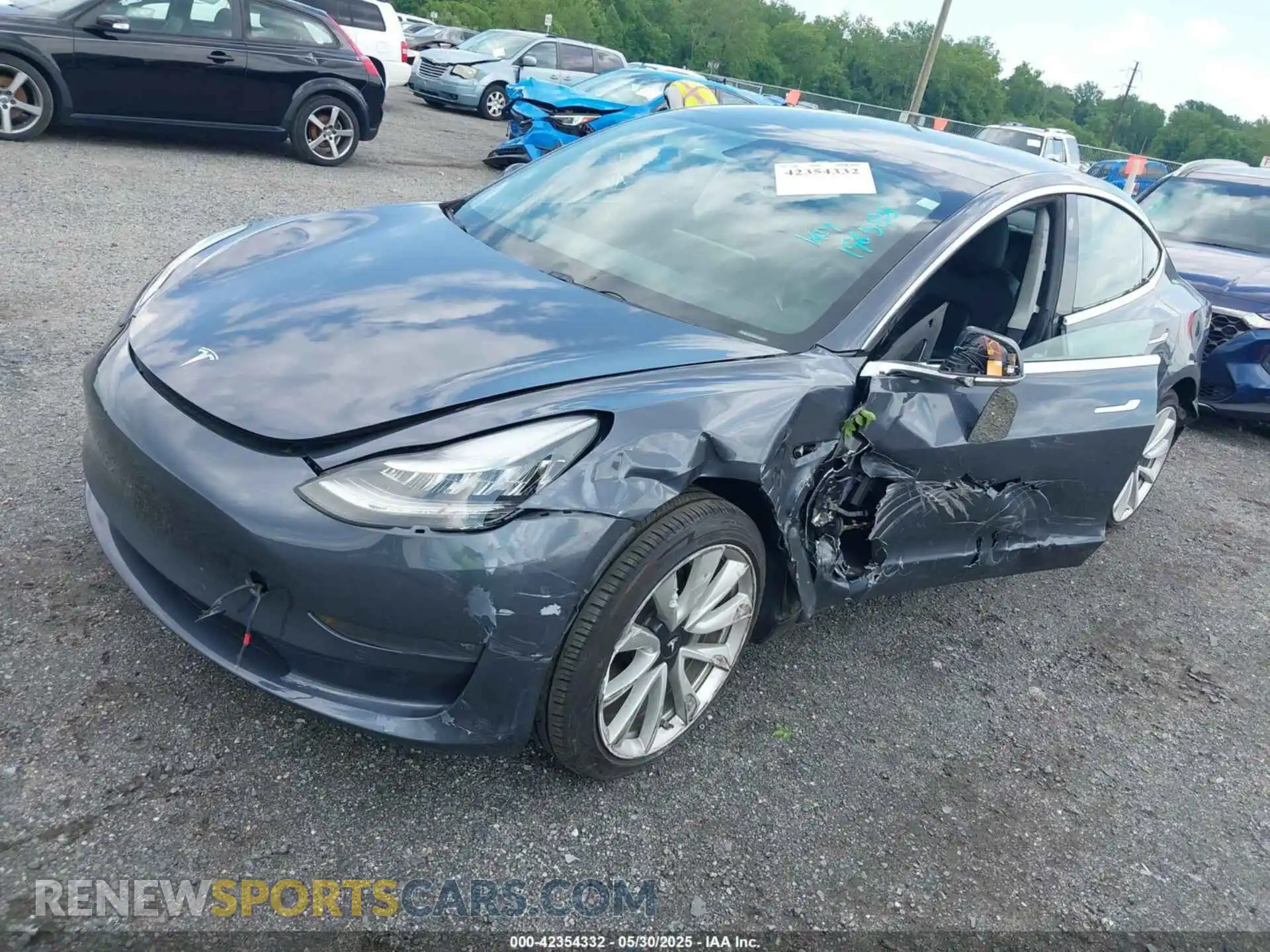 2 Photograph of a damaged car 5YJ3E1EB2LF588925 TESLA MODEL 3 2020