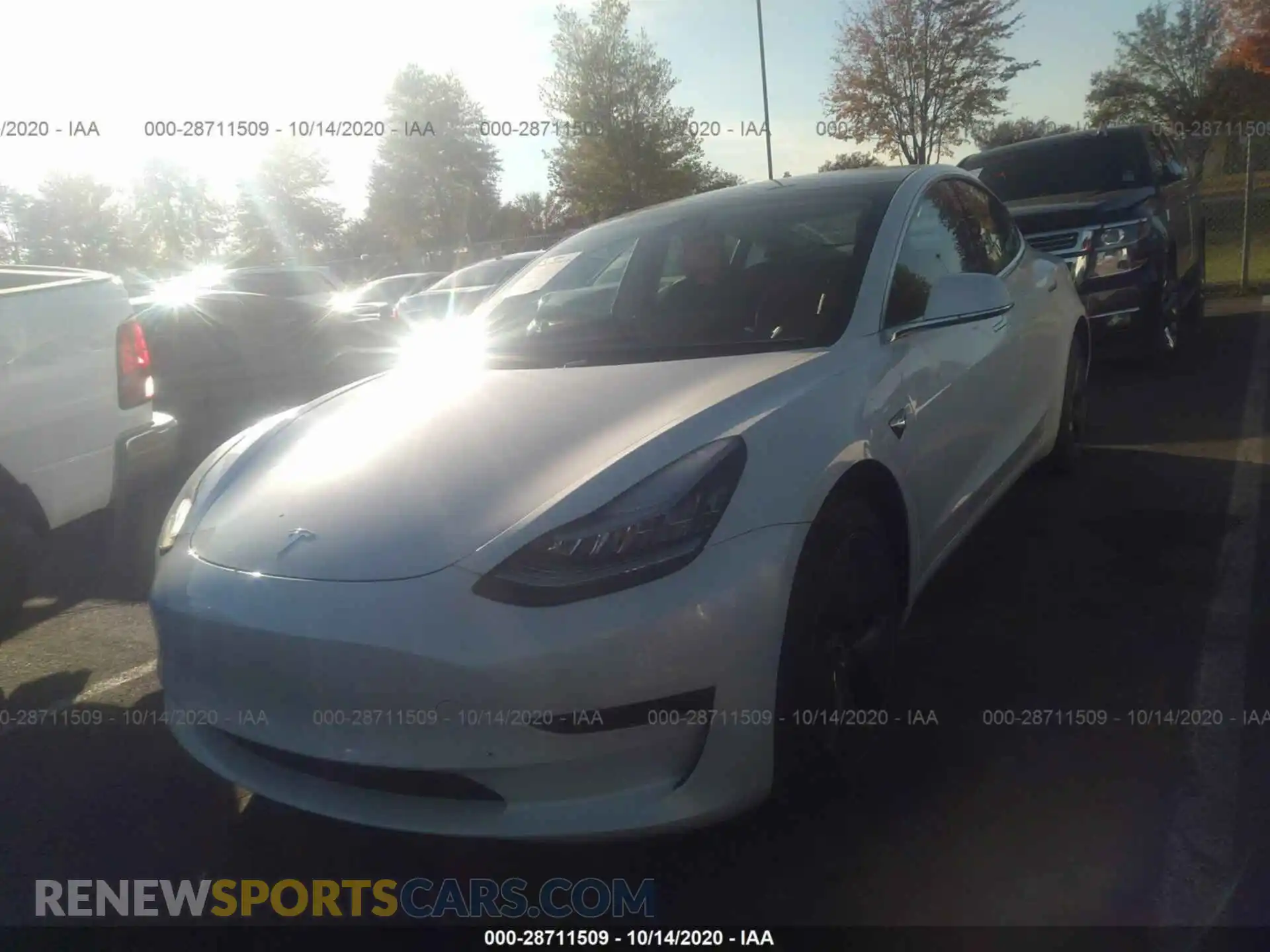 2 Photograph of a damaged car 5YJ3E1EB2LF617985 TESLA MODEL 3 2020