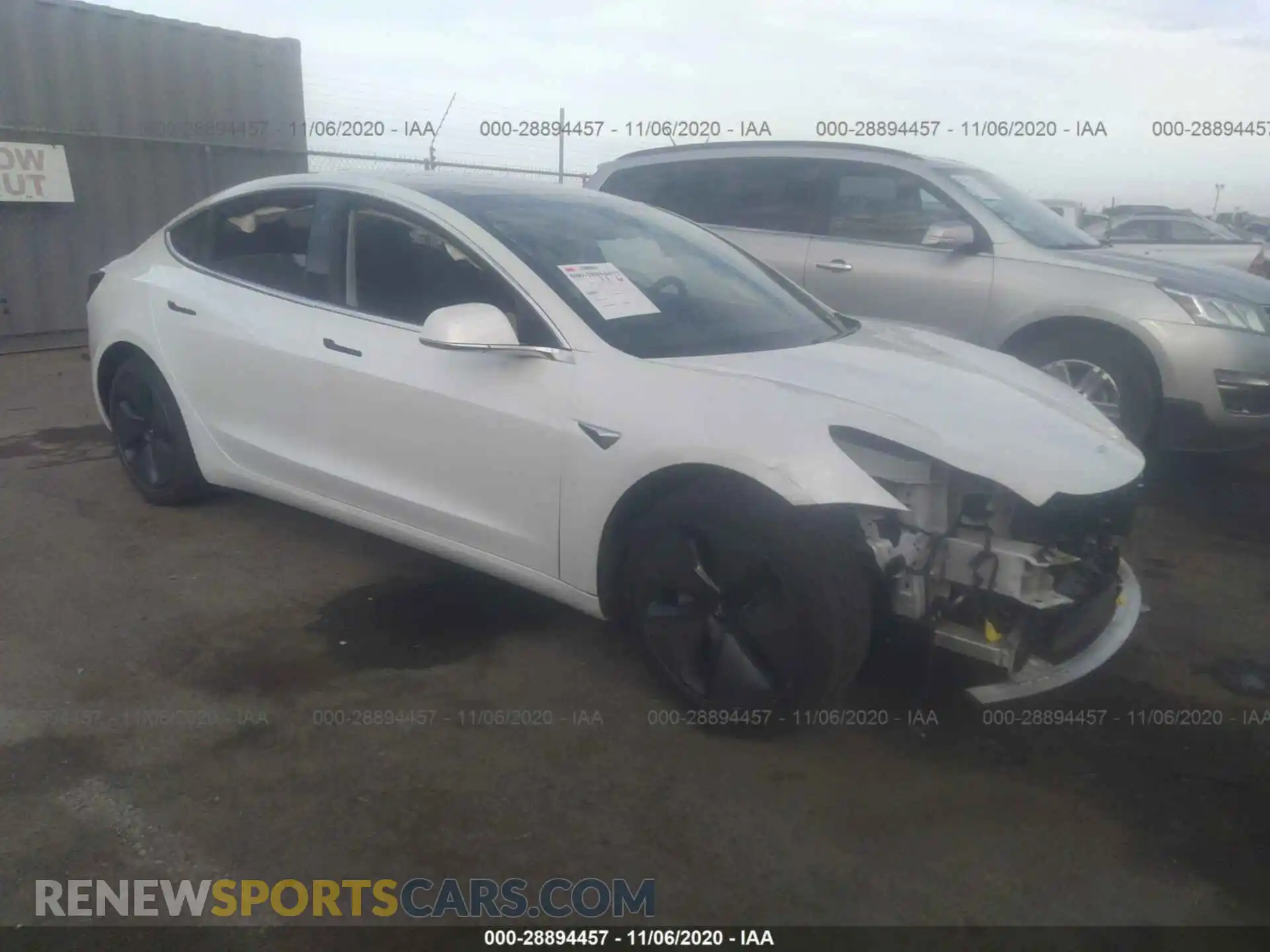 1 Photograph of a damaged car 5YJ3E1EB2LF636598 TESLA MODEL 3 2020