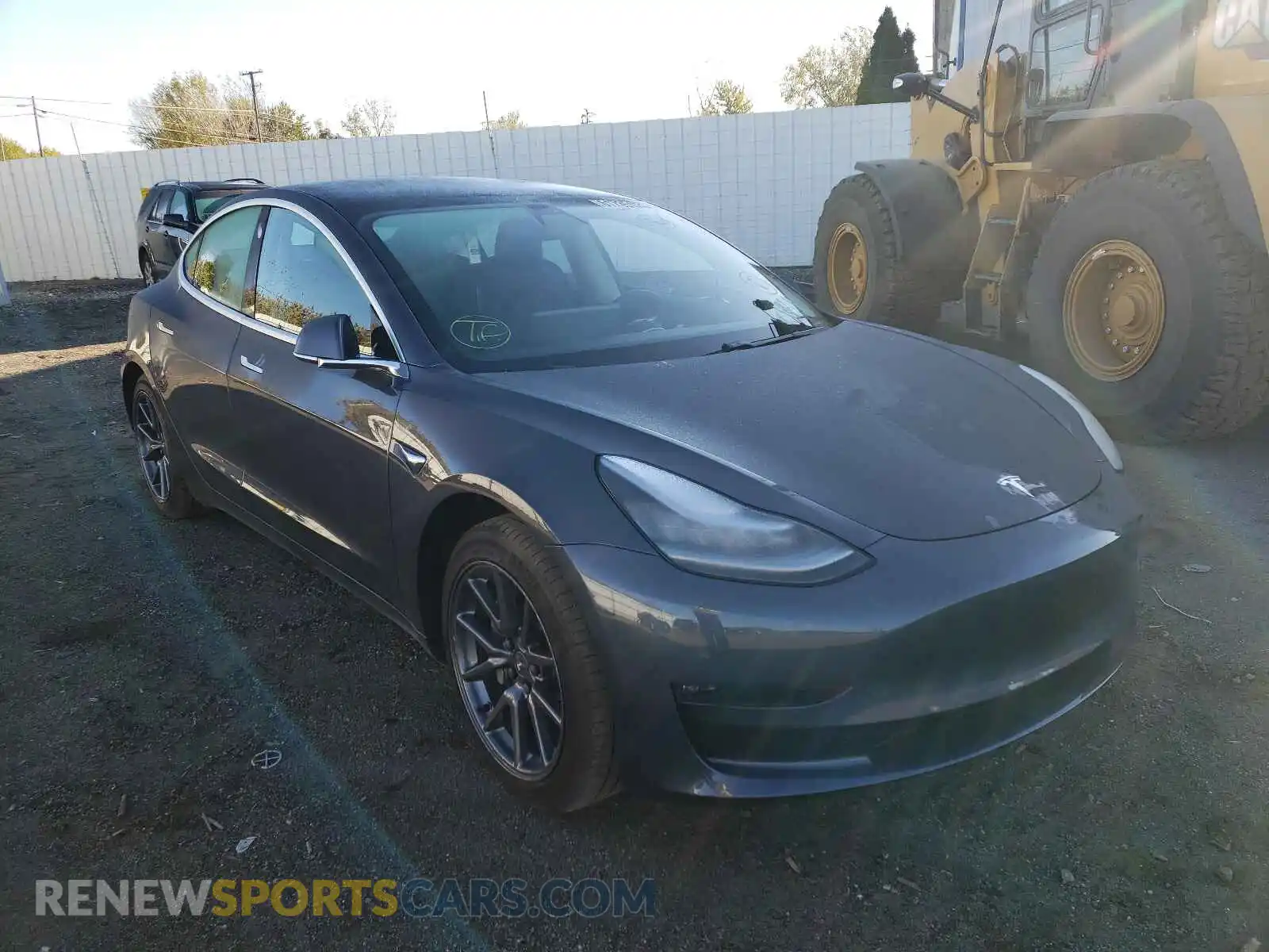1 Photograph of a damaged car 5YJ3E1EB2LF663574 TESLA MODEL 3 2020