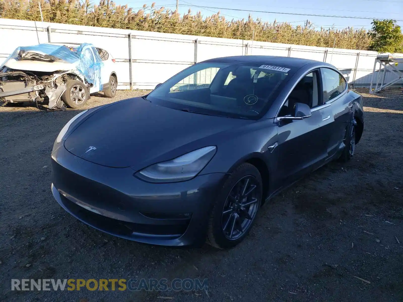 2 Photograph of a damaged car 5YJ3E1EB2LF663574 TESLA MODEL 3 2020
