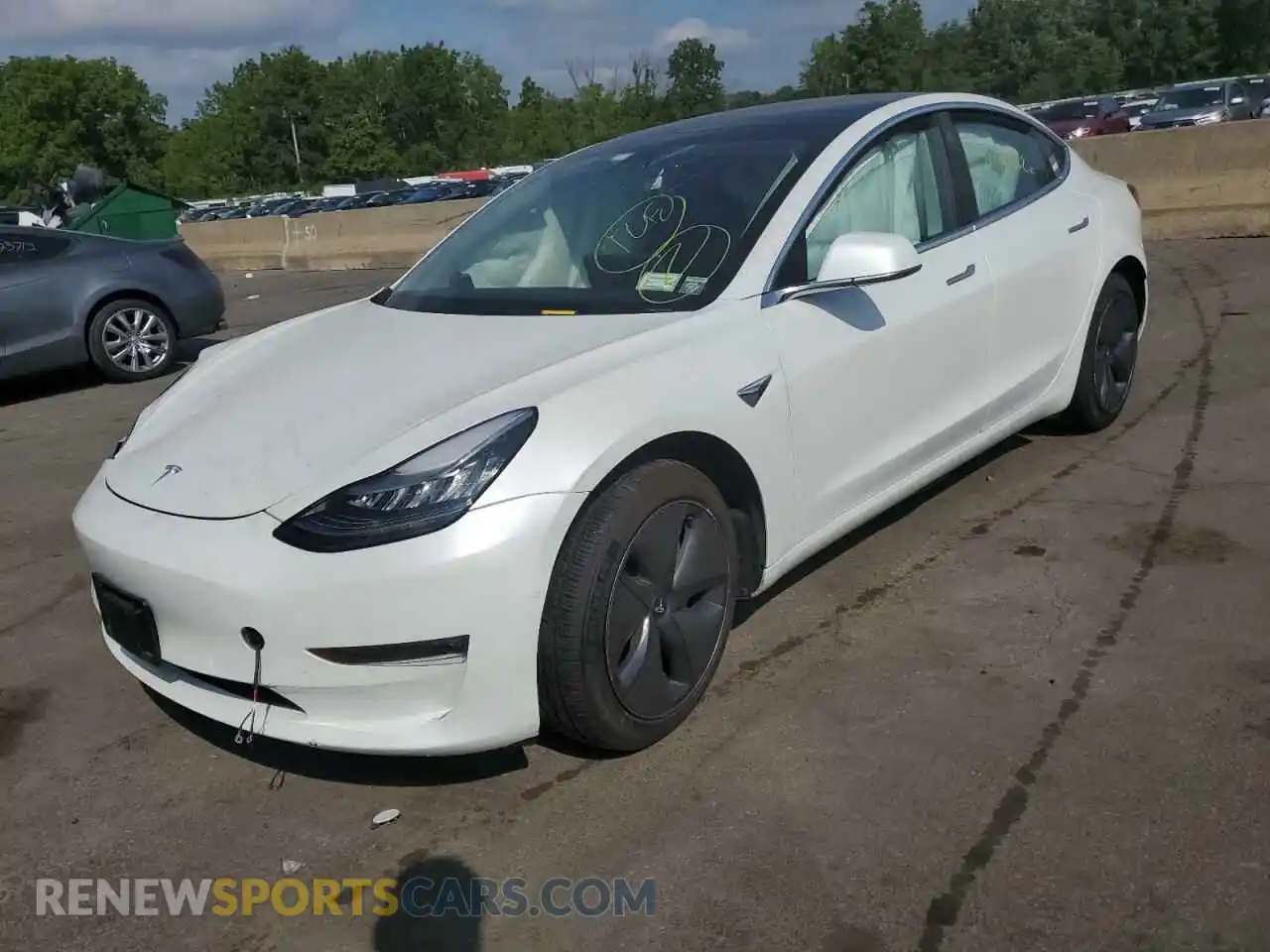 2 Photograph of a damaged car 5YJ3E1EB2LF746518 TESLA MODEL 3 2020