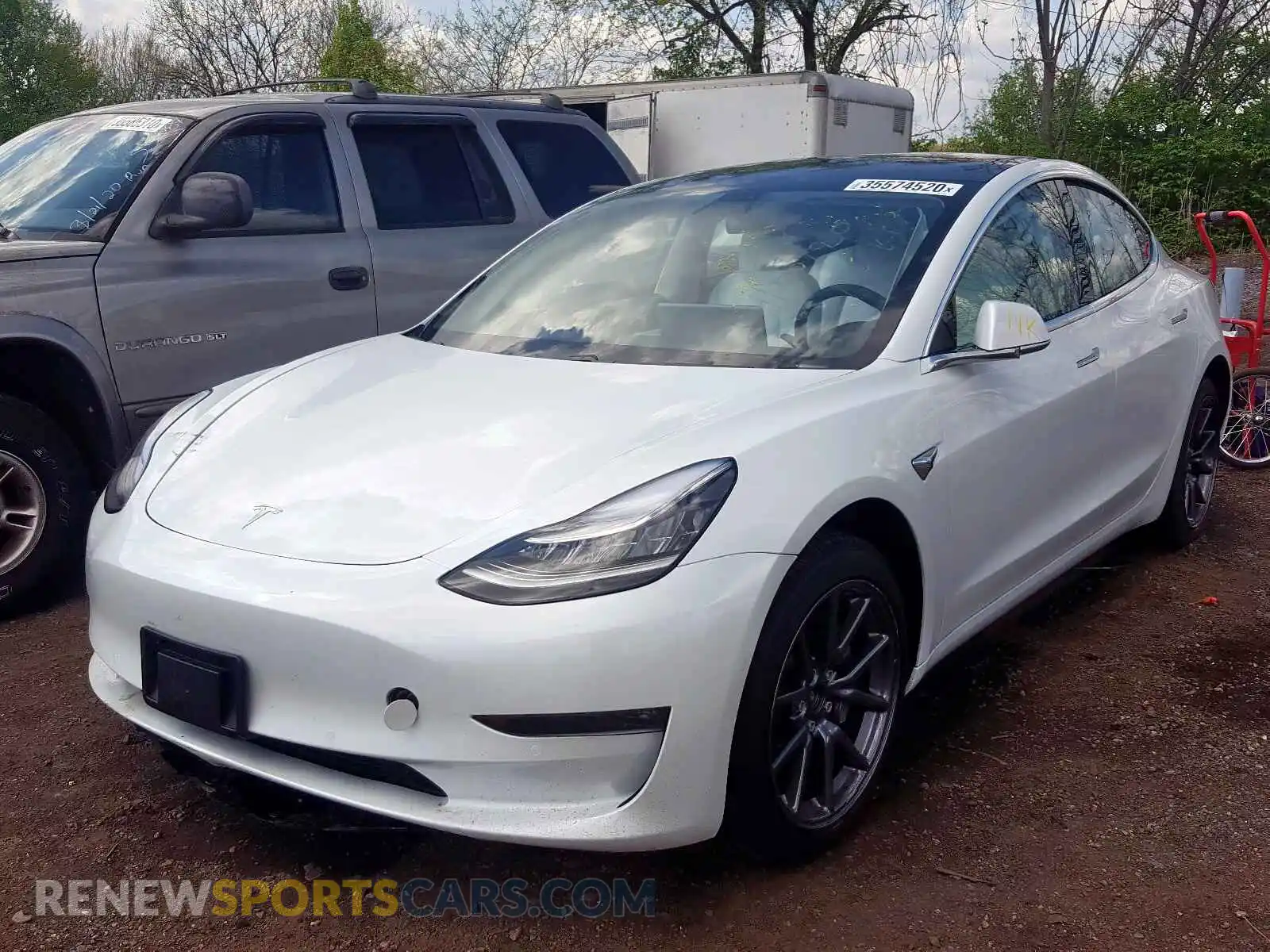2 Photograph of a damaged car 5YJ3E1EB3LF607059 TESLA MODEL 3 2020