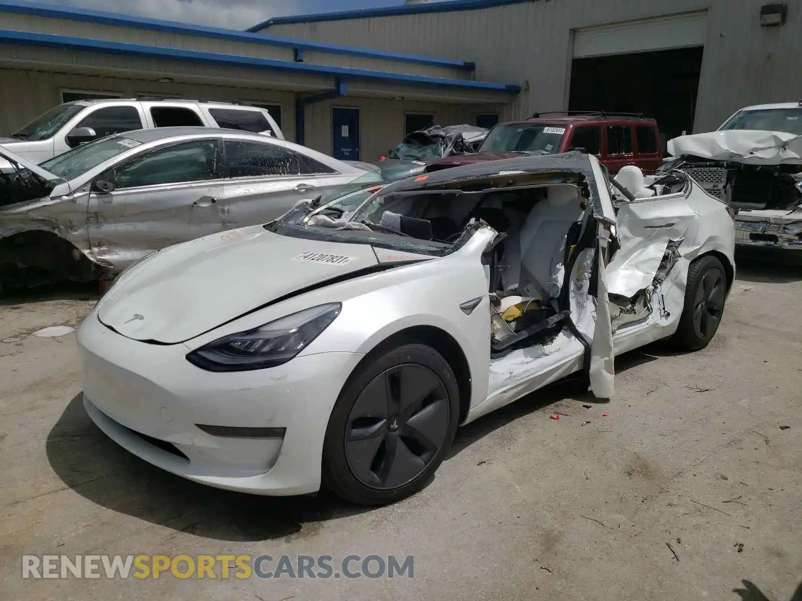 2 Photograph of a damaged car 5YJ3E1EB3LF639705 TESLA MODEL 3 2020