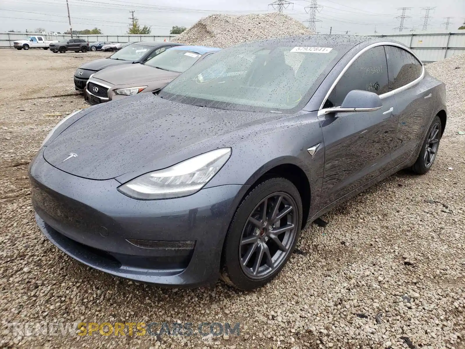 2 Photograph of a damaged car 5YJ3E1EB3LF734927 TESLA MODEL 3 2020