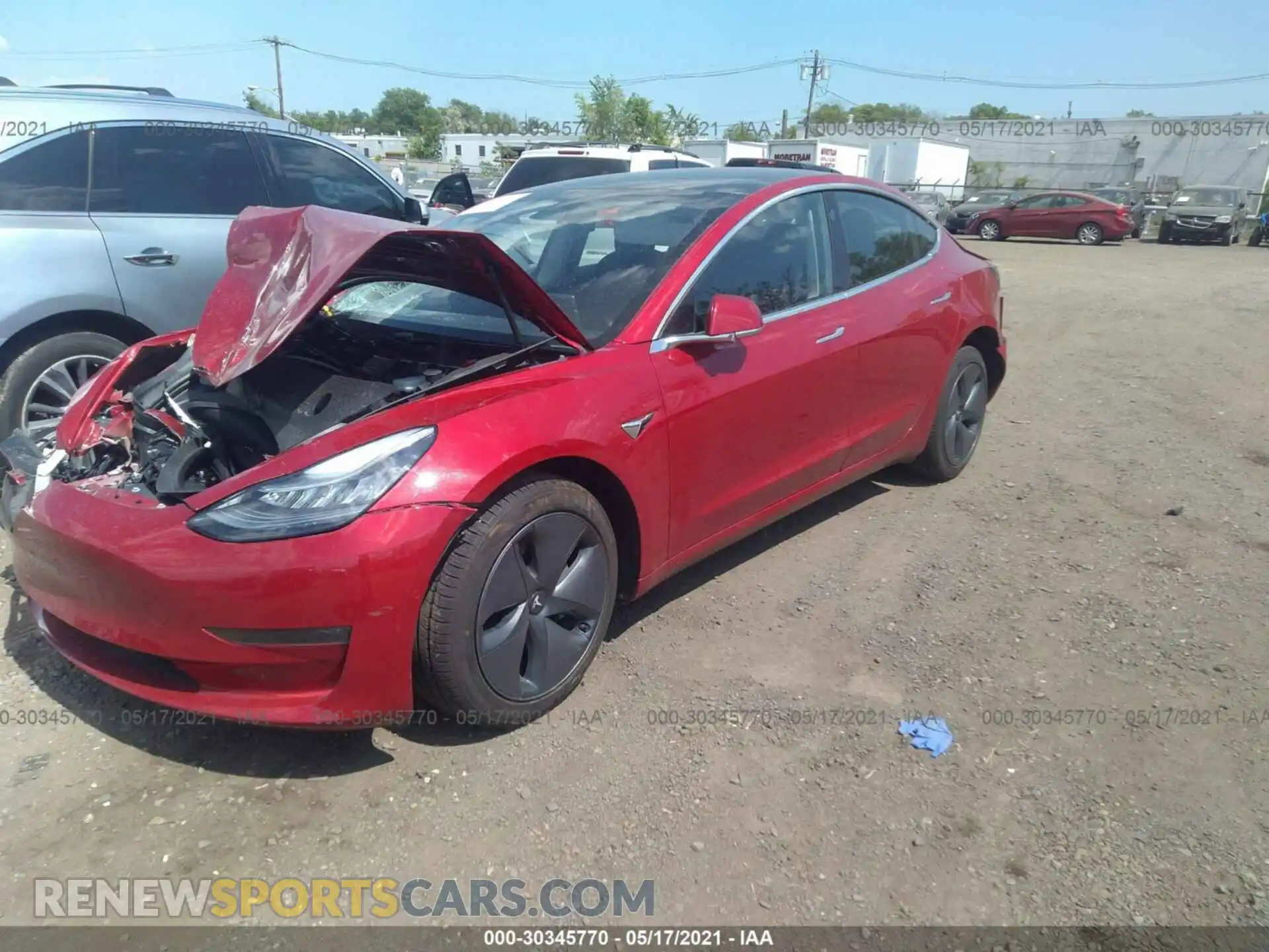 2 Photograph of a damaged car 5YJ3E1EB3LF794884 TESLA MODEL 3 2020