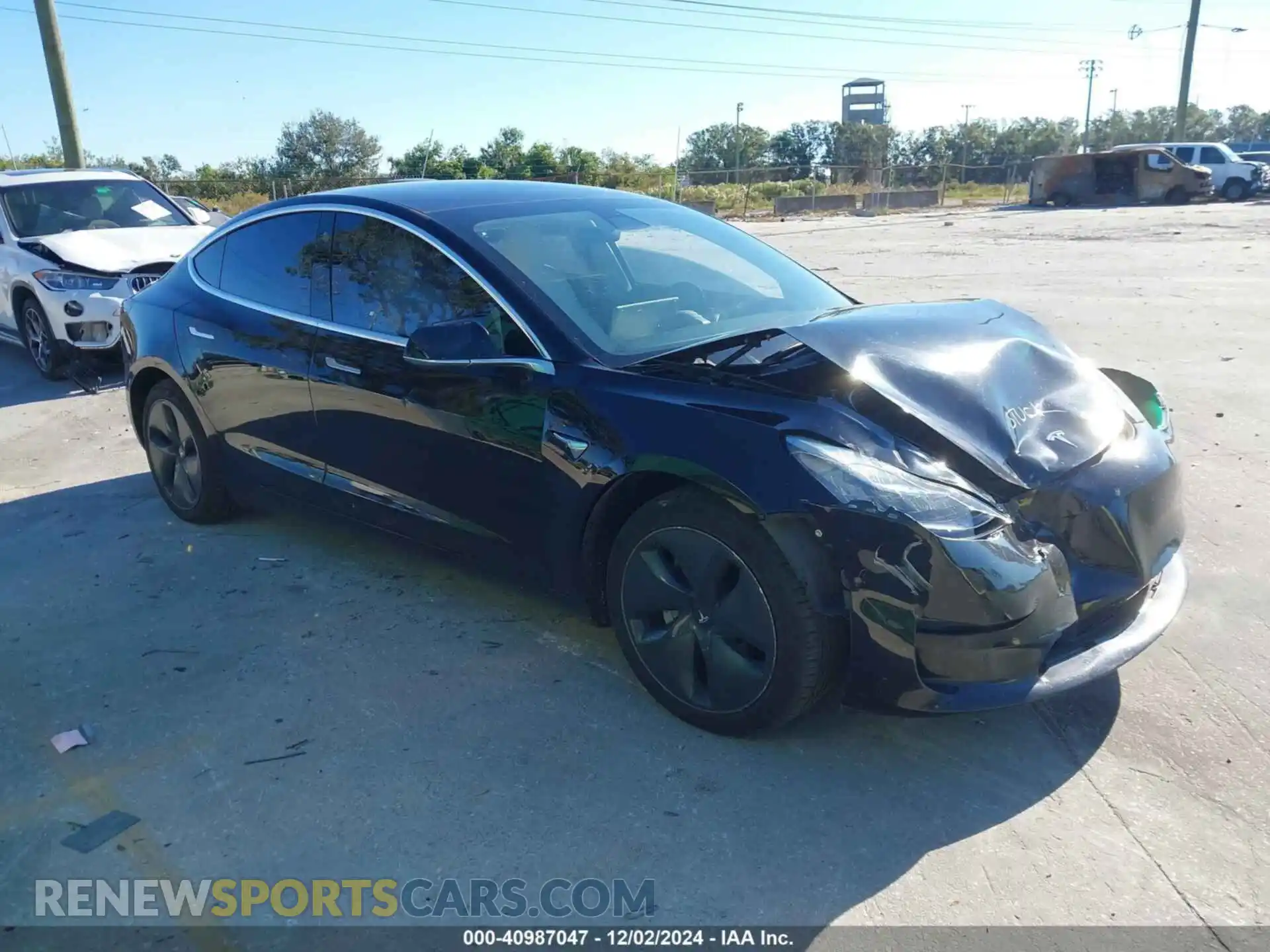 1 Photograph of a damaged car 5YJ3E1EB4LF421319 TESLA MODEL 3 2020