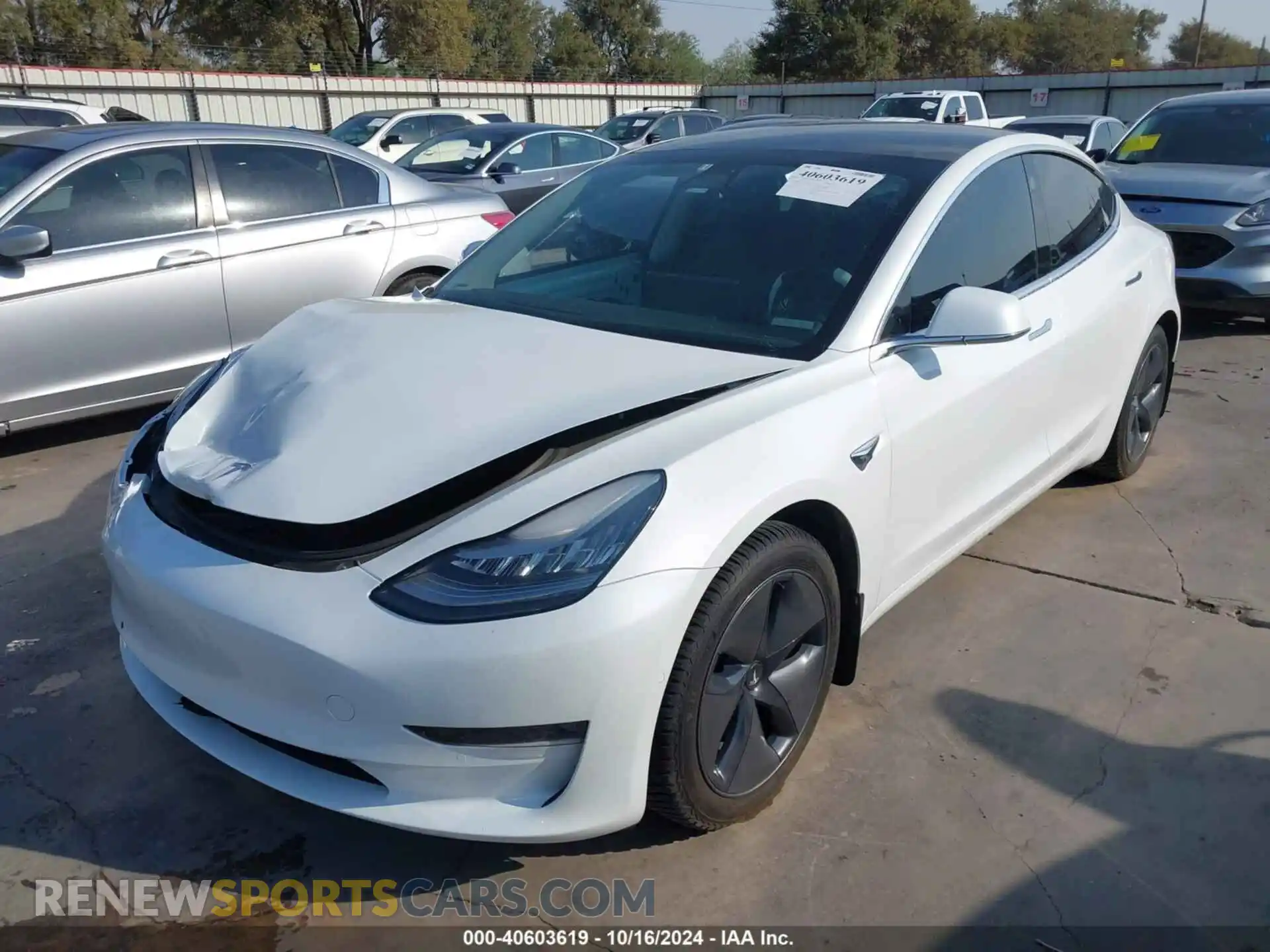 2 fotografías del automóvil dañado 5YJ3E1EB4LF521016 TESLA MODEL 3 2020