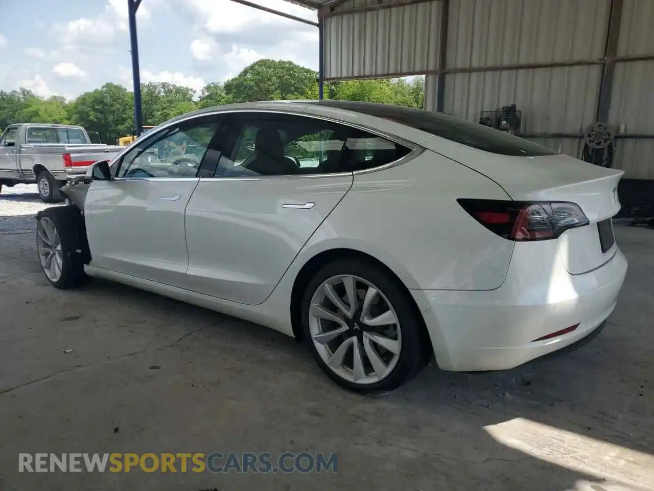 2 Photograph of a damaged car 5YJ3E1EB4LF638577 TESLA MODEL 3 2020