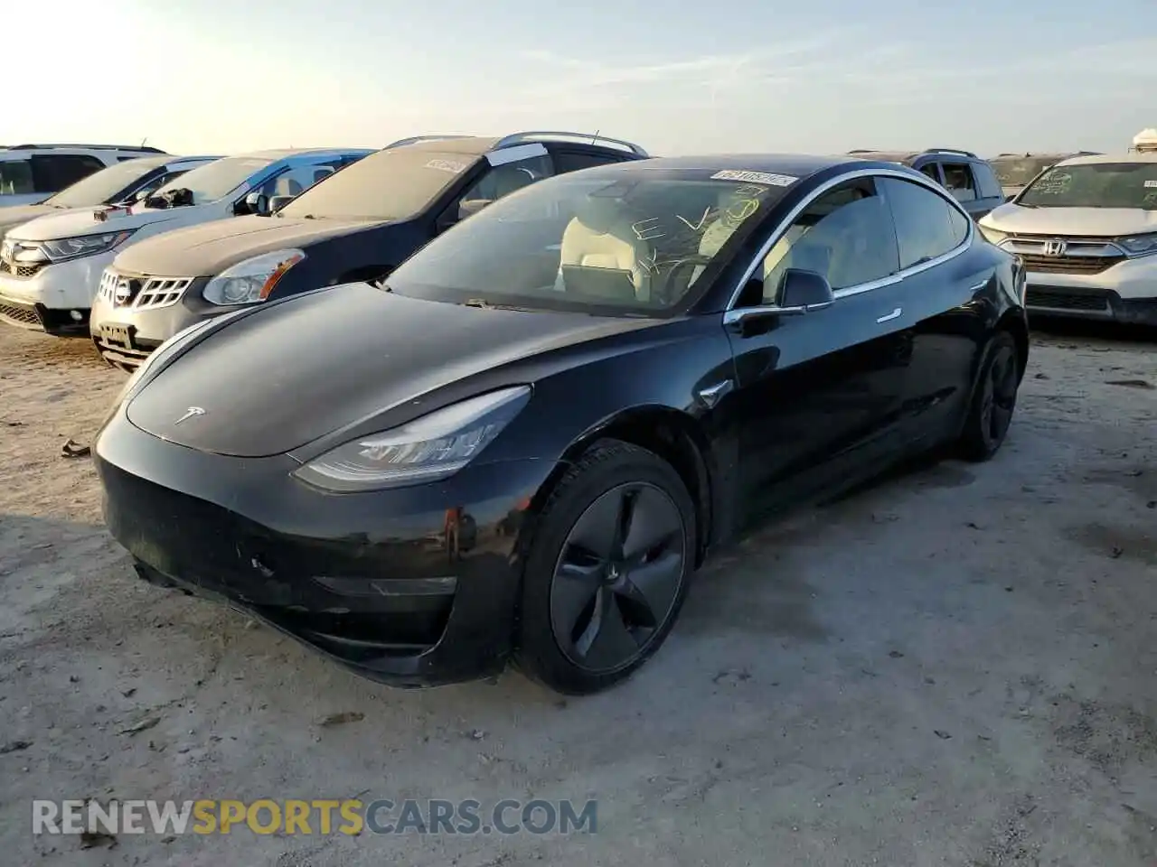 2 Photograph of a damaged car 5YJ3E1EB4LF639034 TESLA MODEL 3 2020