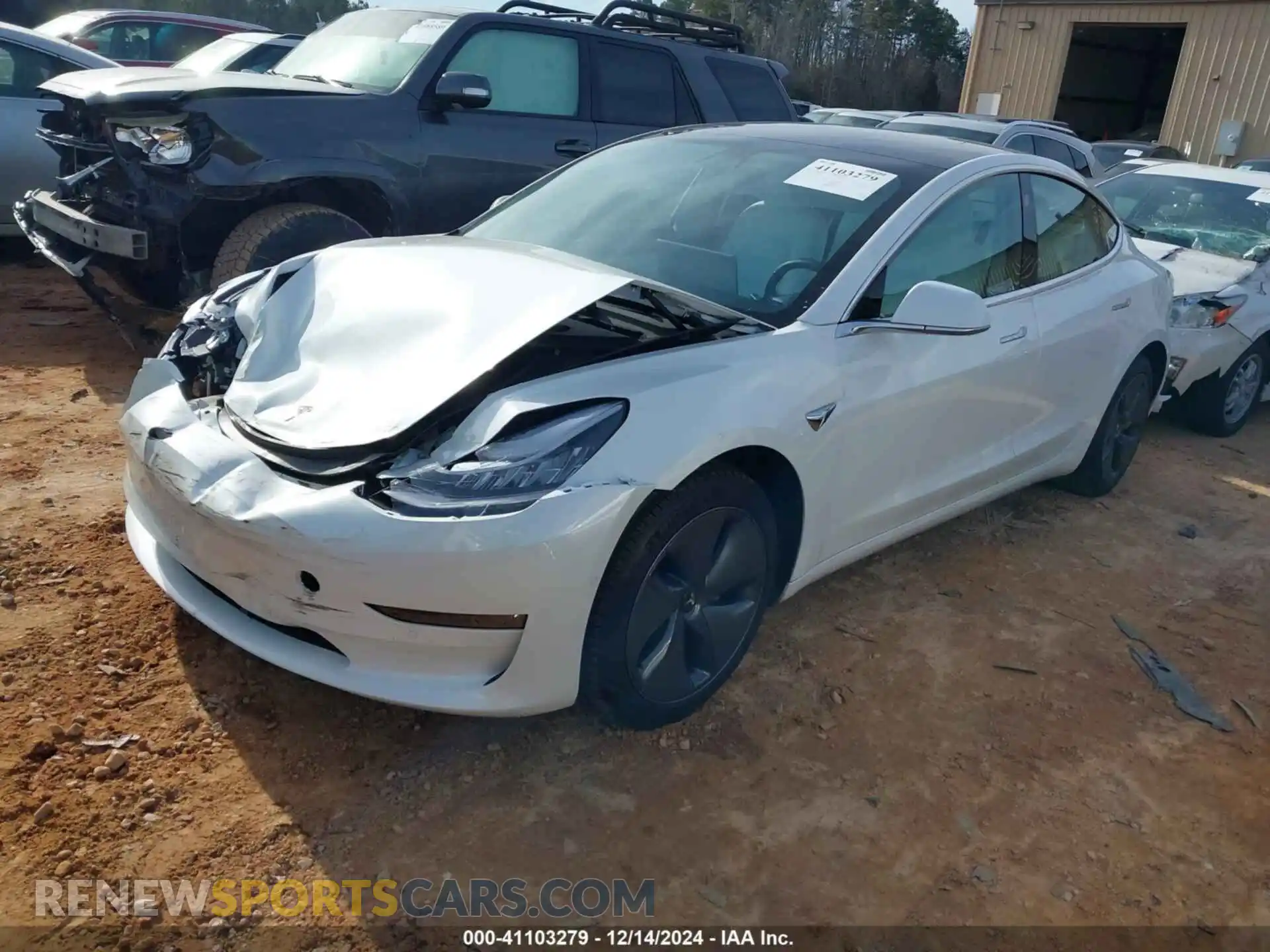 2 Photograph of a damaged car 5YJ3E1EB4LF712662 TESLA MODEL 3 2020