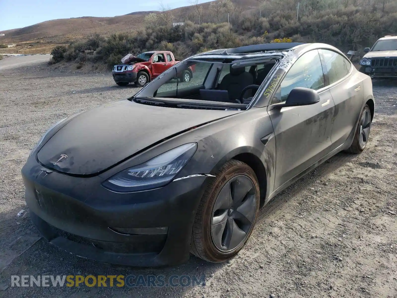2 Photograph of a damaged car 5YJ3E1EB4LF790794 TESLA MODEL 3 2020