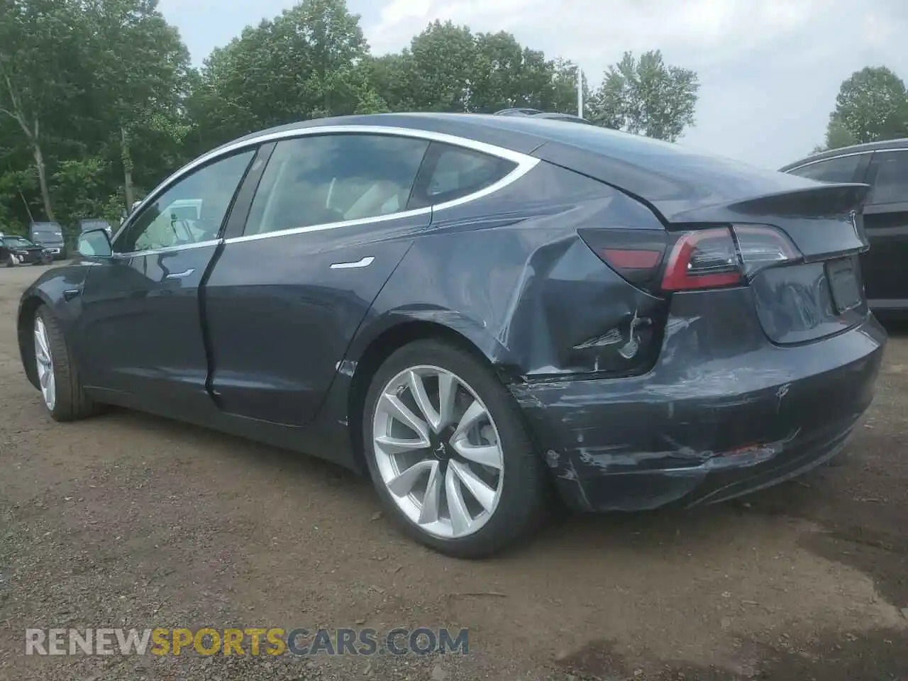 2 fotografías del automóvil dañado 5YJ3E1EB4LF795395 TESLA MODEL 3 2020