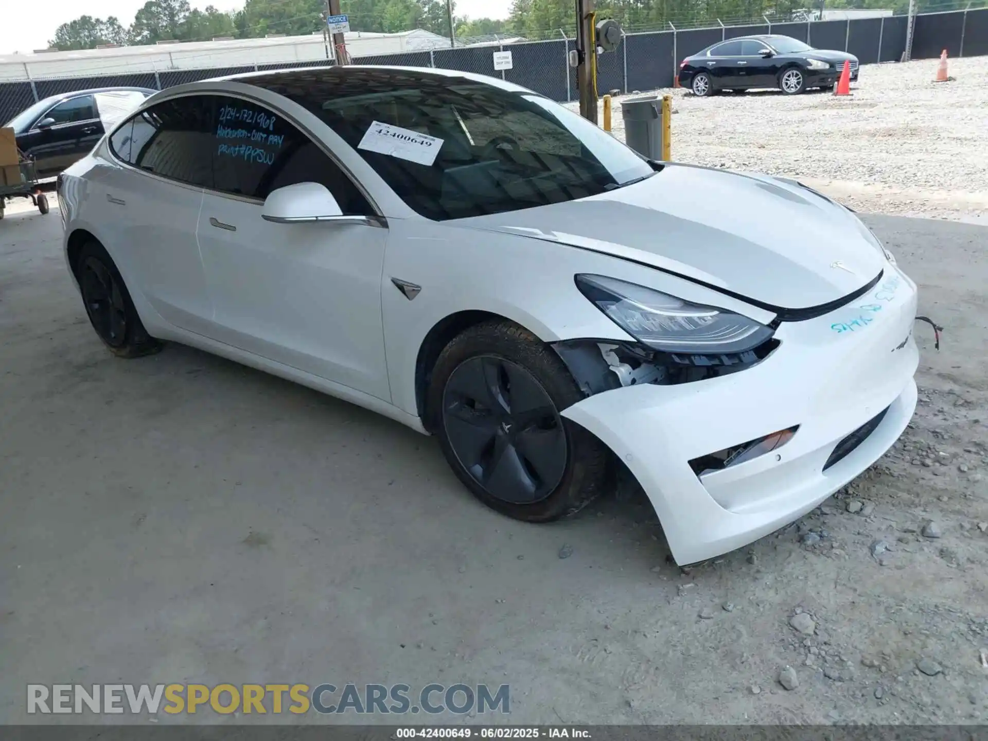 1 Photograph of a damaged car 5YJ3E1EB5LF628074 TESLA MODEL 3 2020