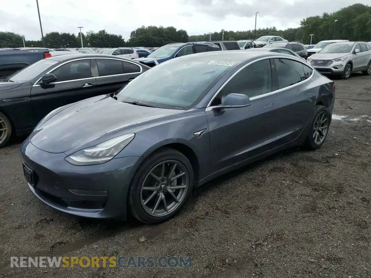 1 Photograph of a damaged car 5YJ3E1EB5LF635185 TESLA MODEL 3 2020