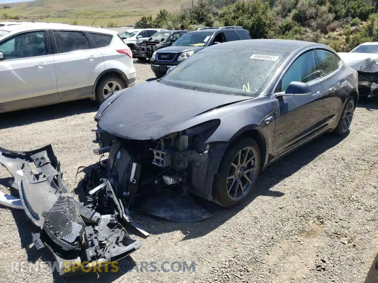2 fotografías del automóvil dañado 5YJ3E1EB5LF711164 TESLA MODEL 3 2020