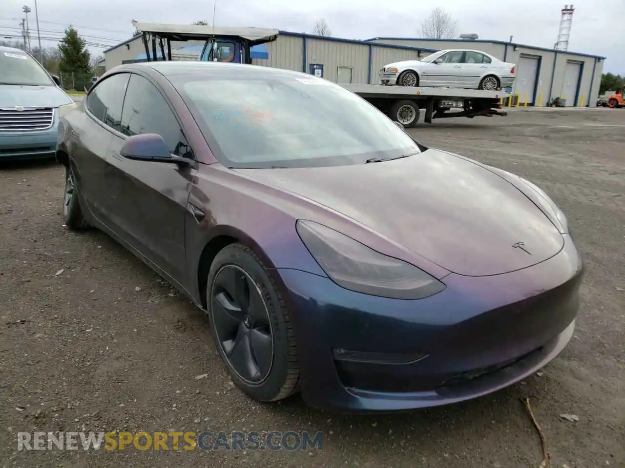 1 Photograph of a damaged car 5YJ3E1EB6LF599815 TESLA MODEL 3 2020