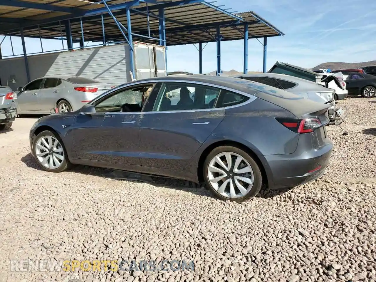 2 Photograph of a damaged car 5YJ3E1EB6LF638063 TESLA MODEL 3 2020