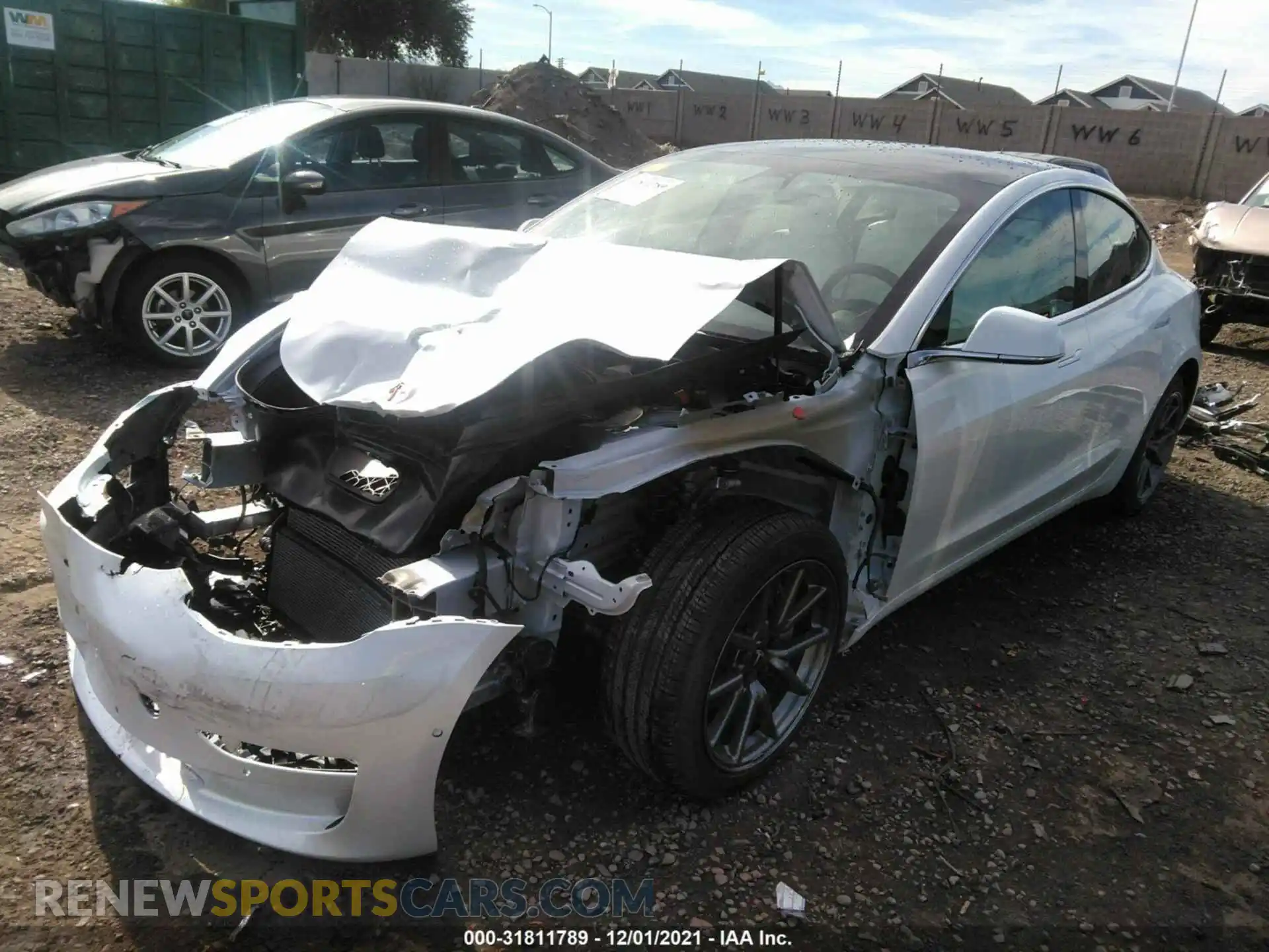 2 Photograph of a damaged car 5YJ3E1EB6LF712694 TESLA MODEL 3 2020
