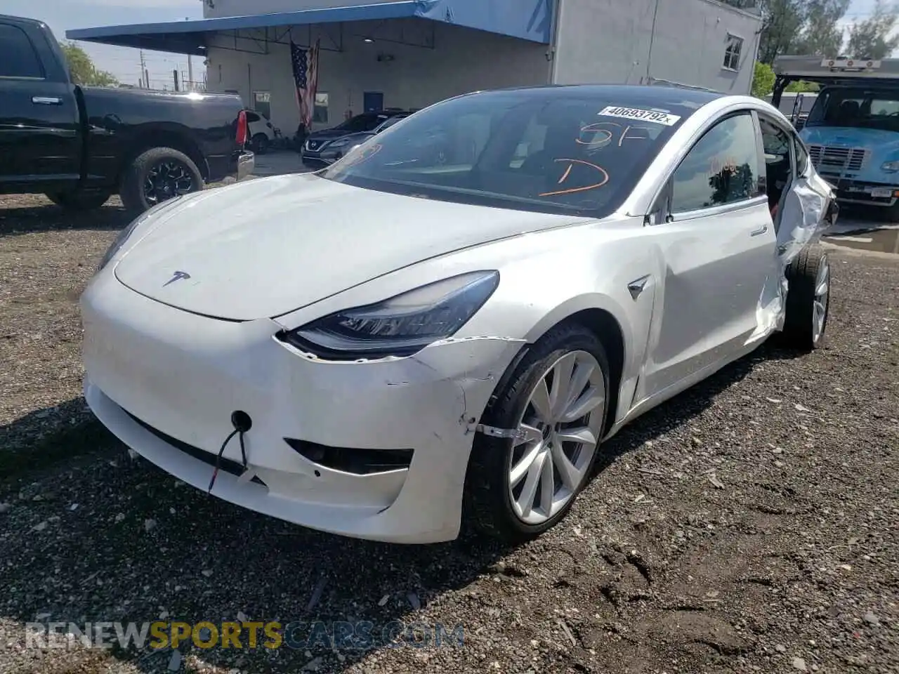 2 Photograph of a damaged car 5YJ3E1EB7LF638718 TESLA MODEL 3 2020