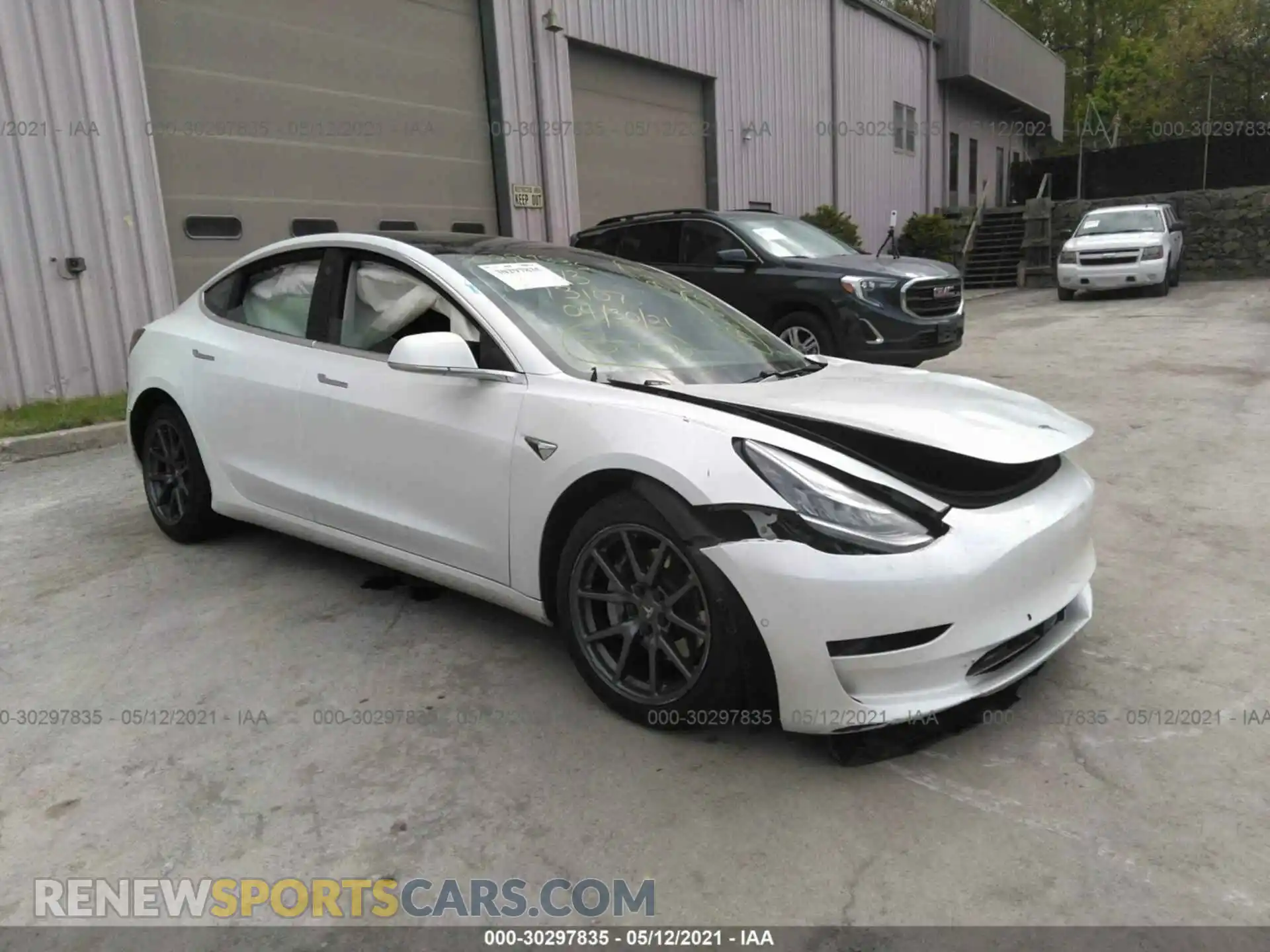 1 Photograph of a damaged car 5YJ3E1EB7LF735224 TESLA MODEL 3 2020