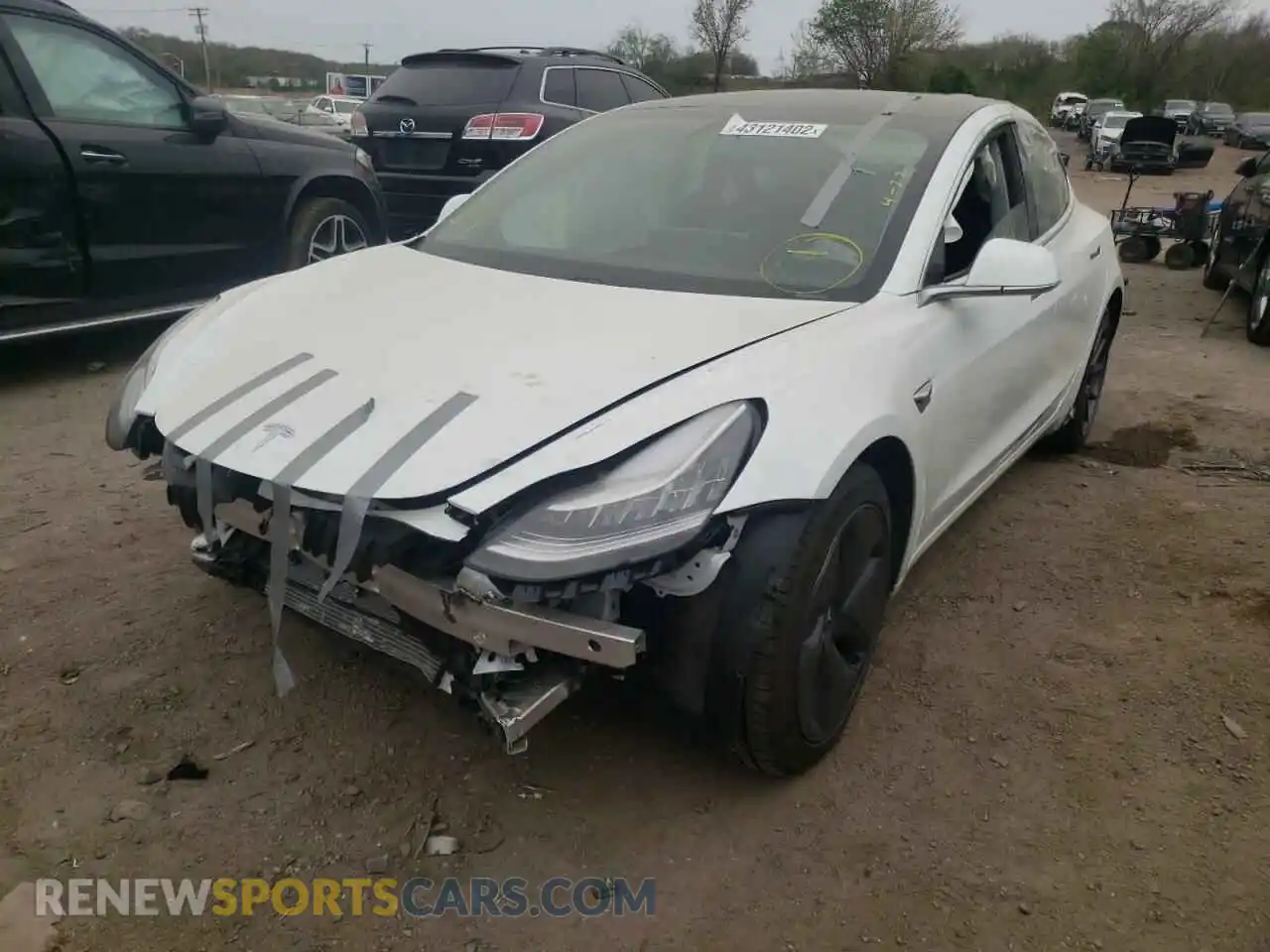 2 fotografías del automóvil dañado 5YJ3E1EB7LF787212 TESLA MODEL 3 2020